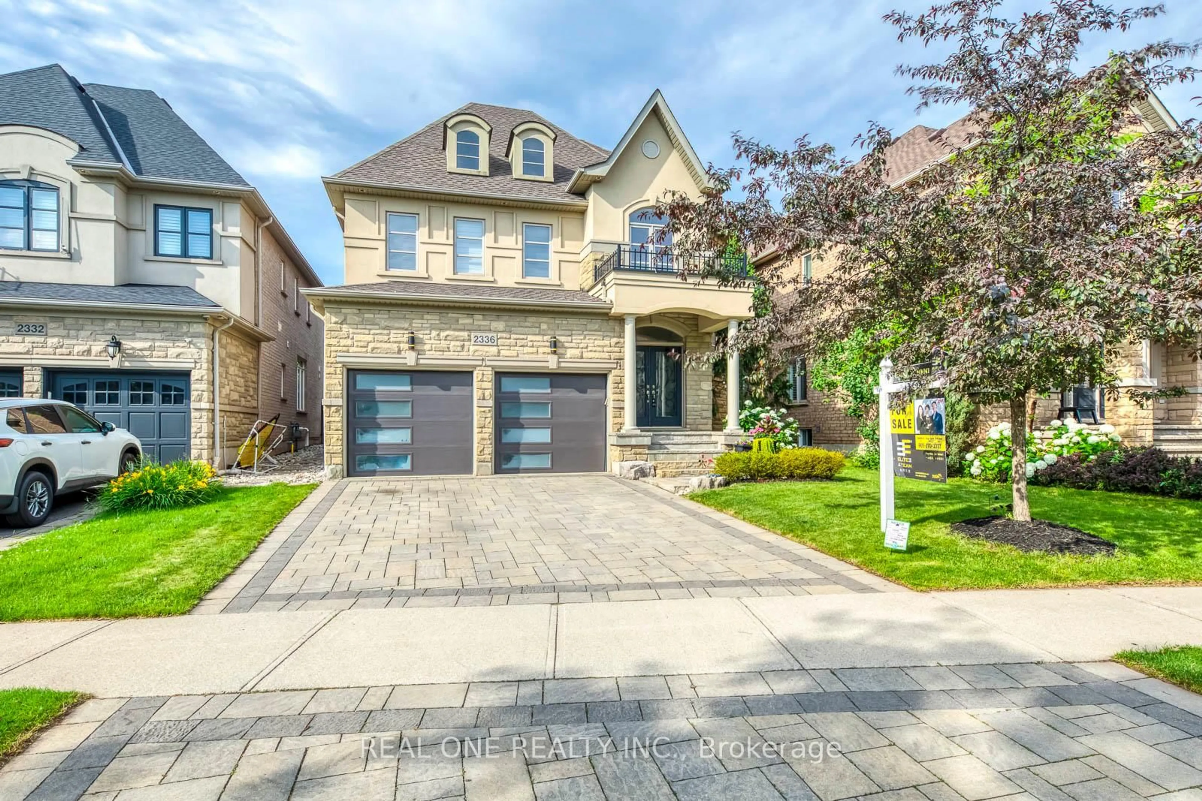 Home with brick exterior material, street for 2336 Thruxton Dr, Oakville Ontario L6H 0C5