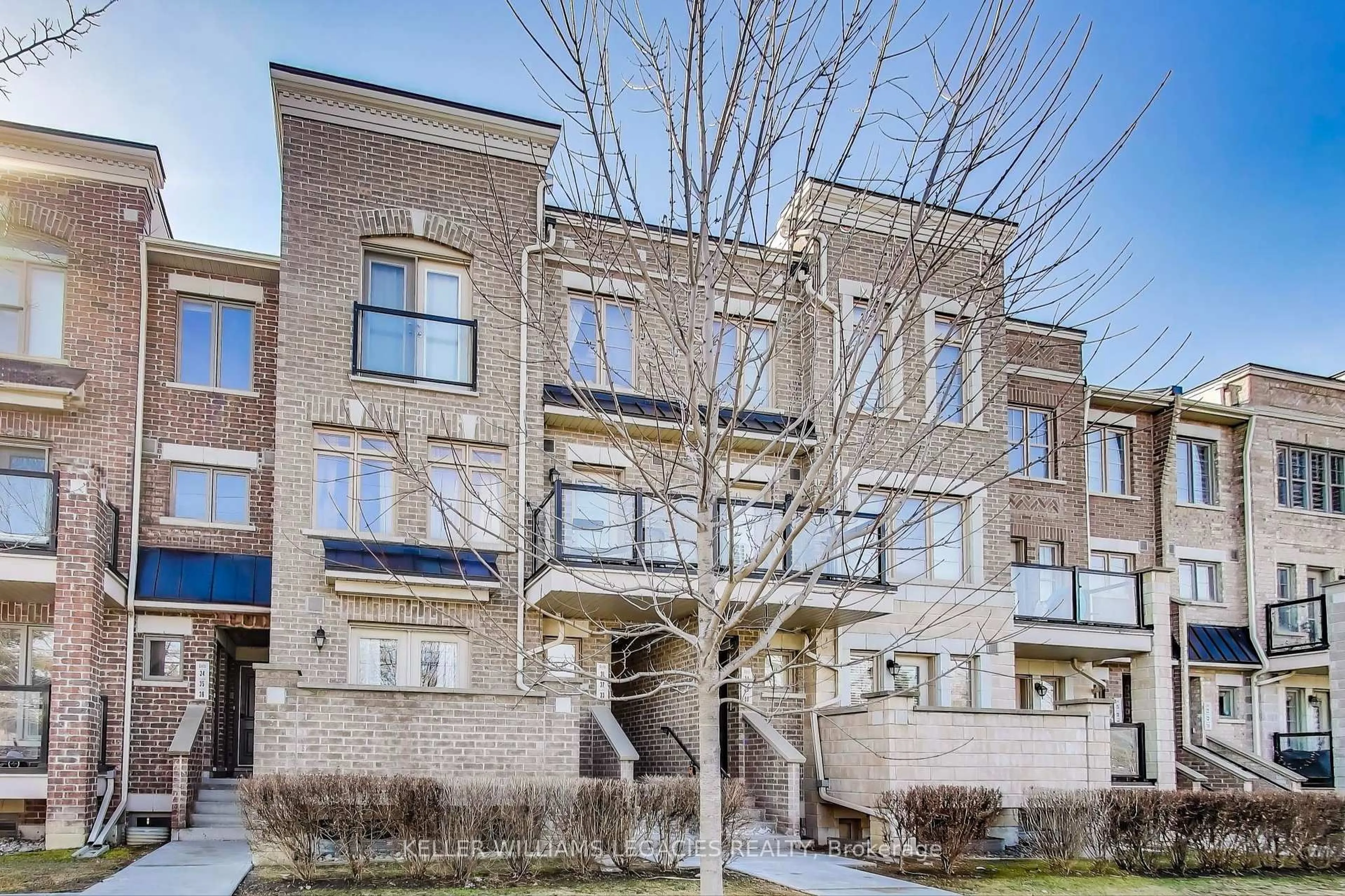 Home with brick exterior material, street for 2335 Sheppard Ave #31, Toronto Ontario M9M 0E7