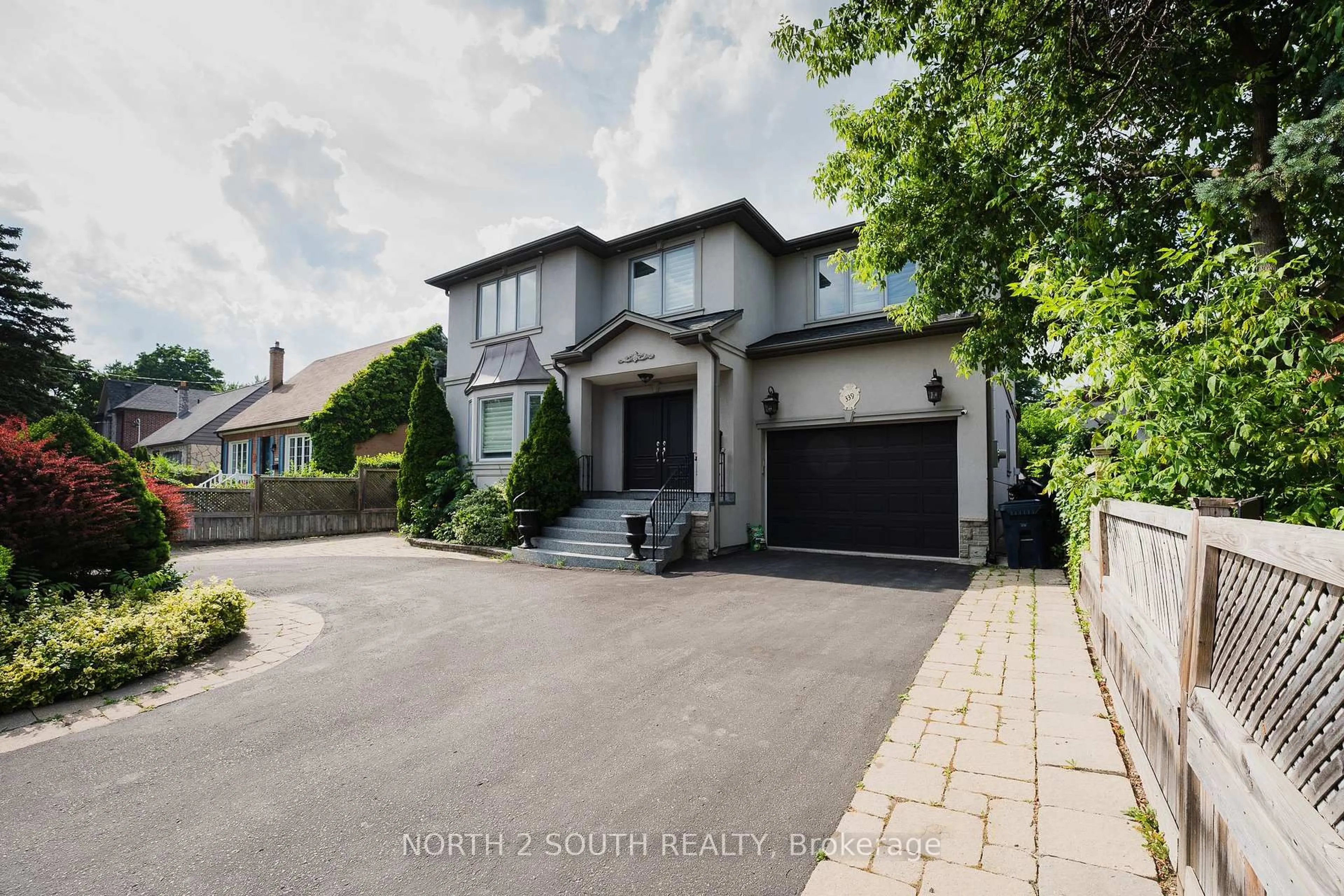 Home with brick exterior material, street for 339 Burnhamthorpe Rd, Toronto Ontario M9B 2A2