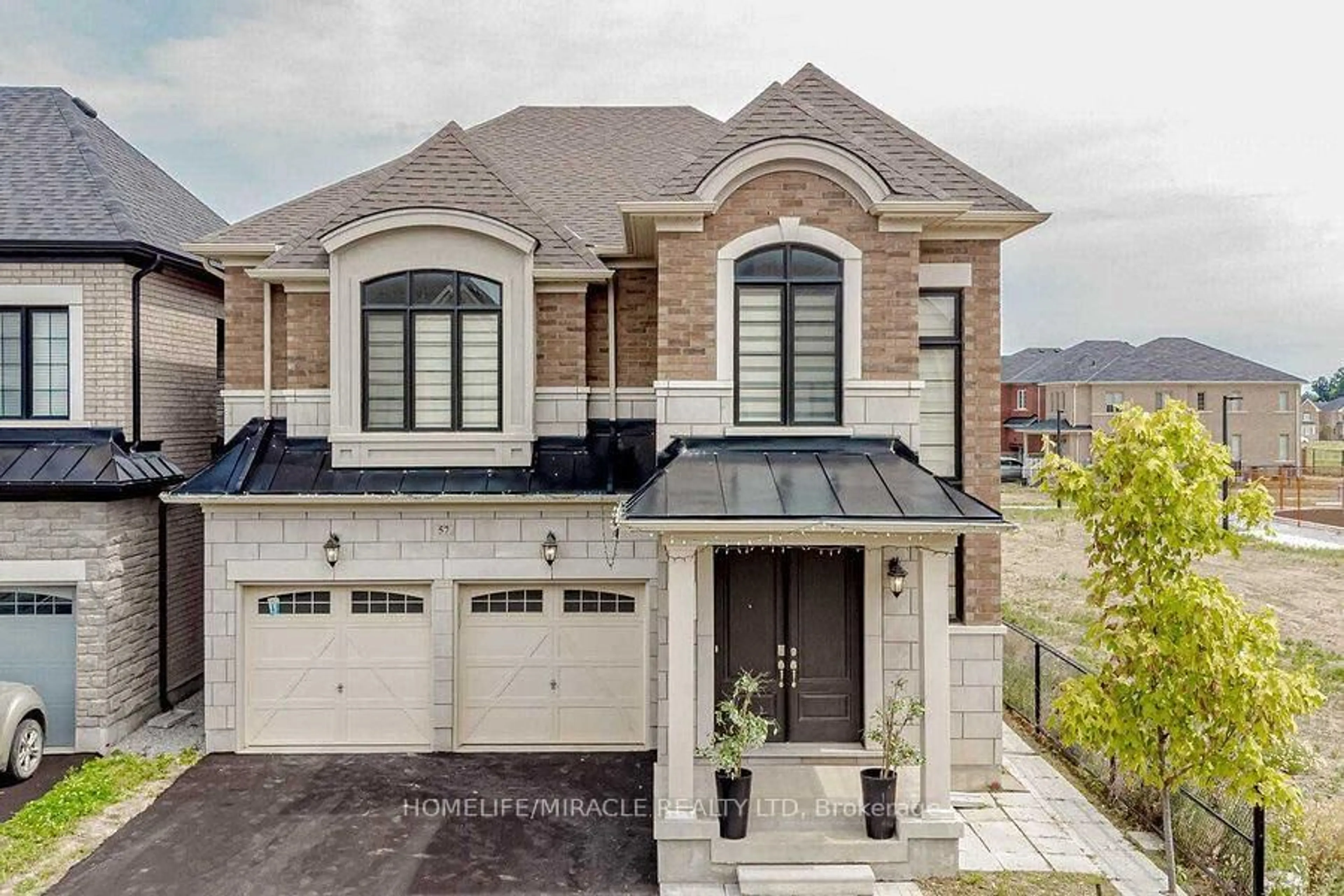 Home with brick exterior material, street for 57 Brent Stephens Way, Brampton Ontario L7A 5B5