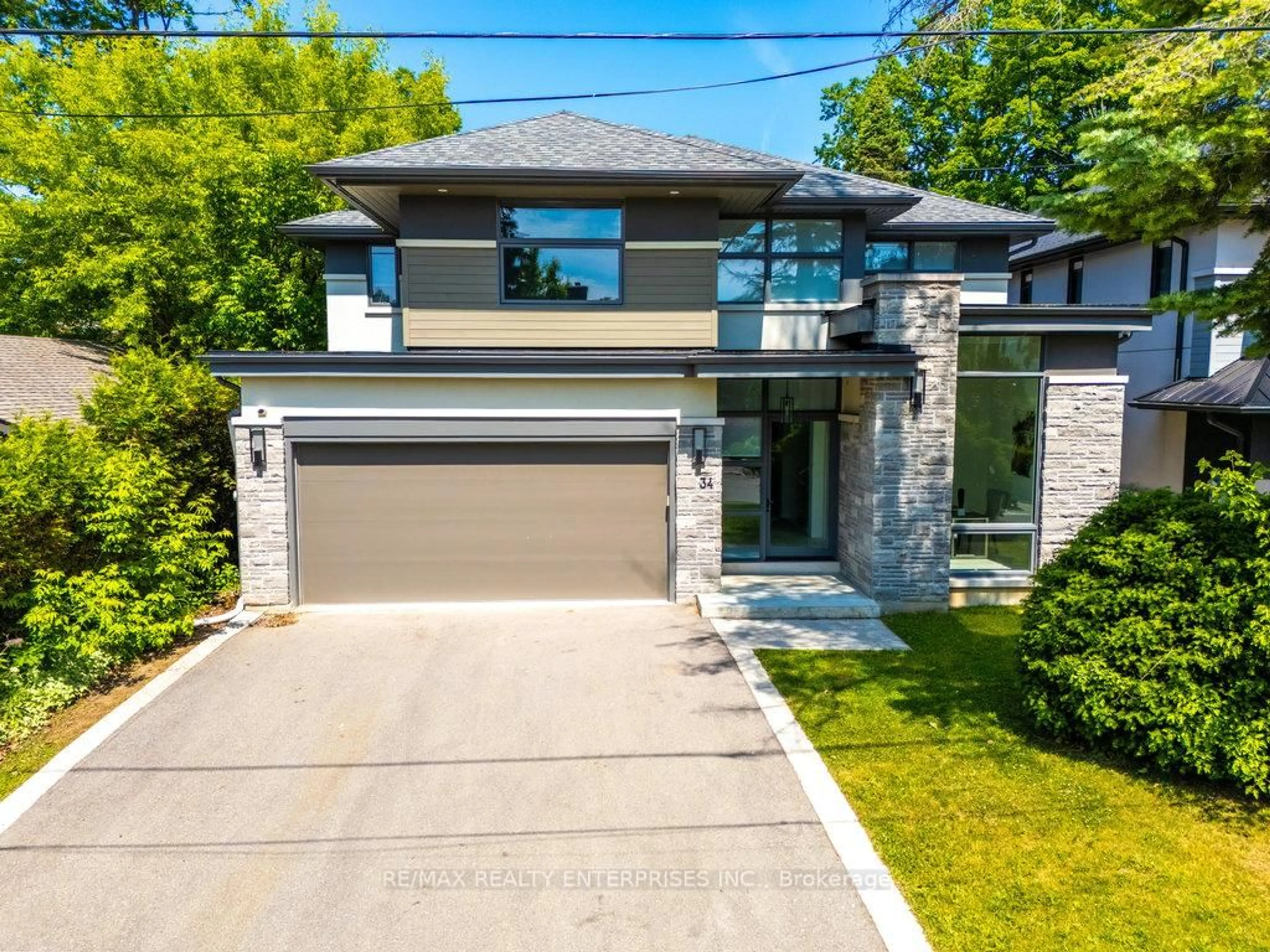 Home with brick exterior material, street for 34 Onaway Rd, Mississauga Ontario L5G 1A4