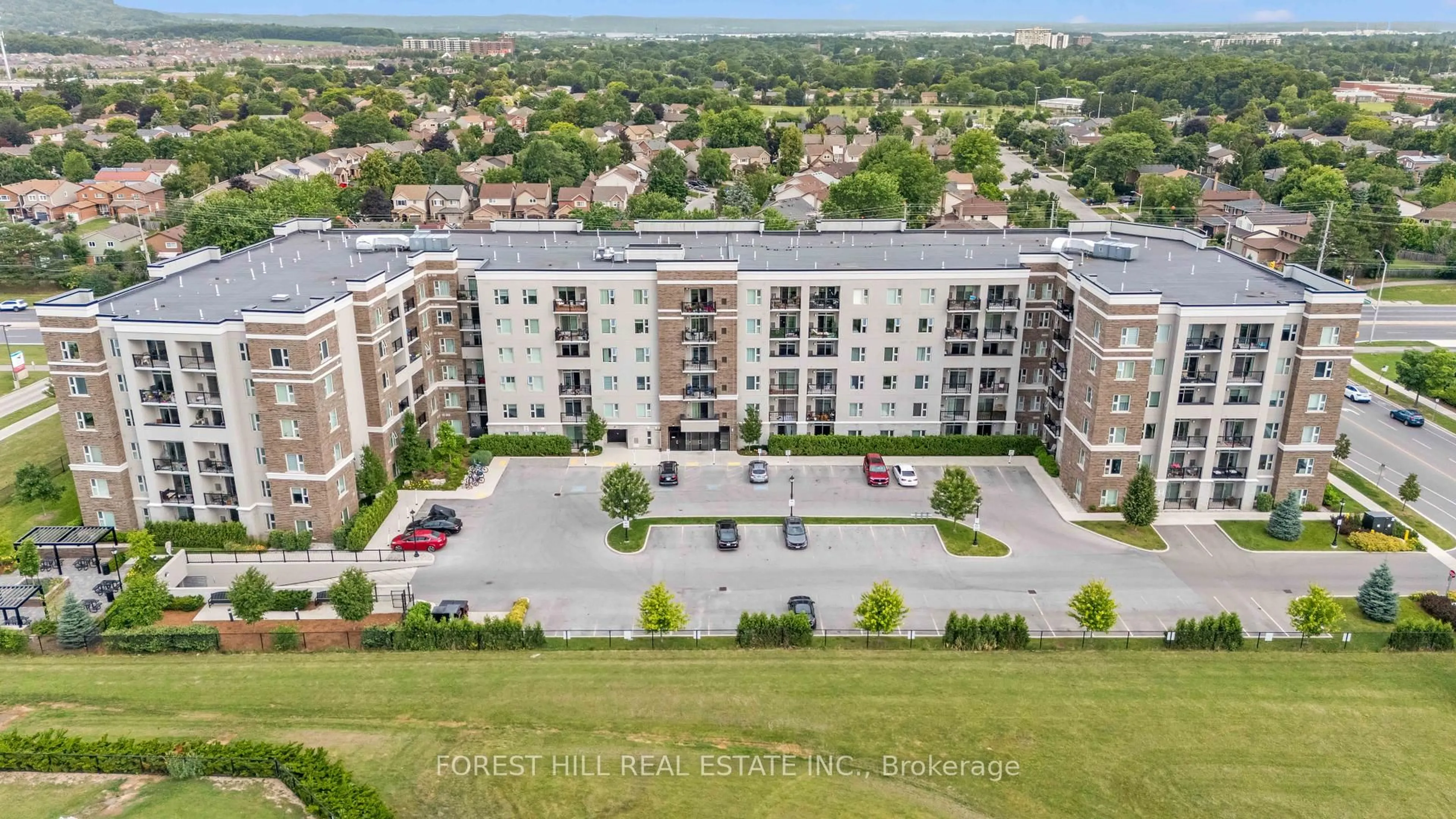 A pic from outside/outdoor area/front of a property/back of a property/a pic from drone, city buildings view from balcony for 610 Farmstead Dr #201, Milton Ontario L9T 9X5