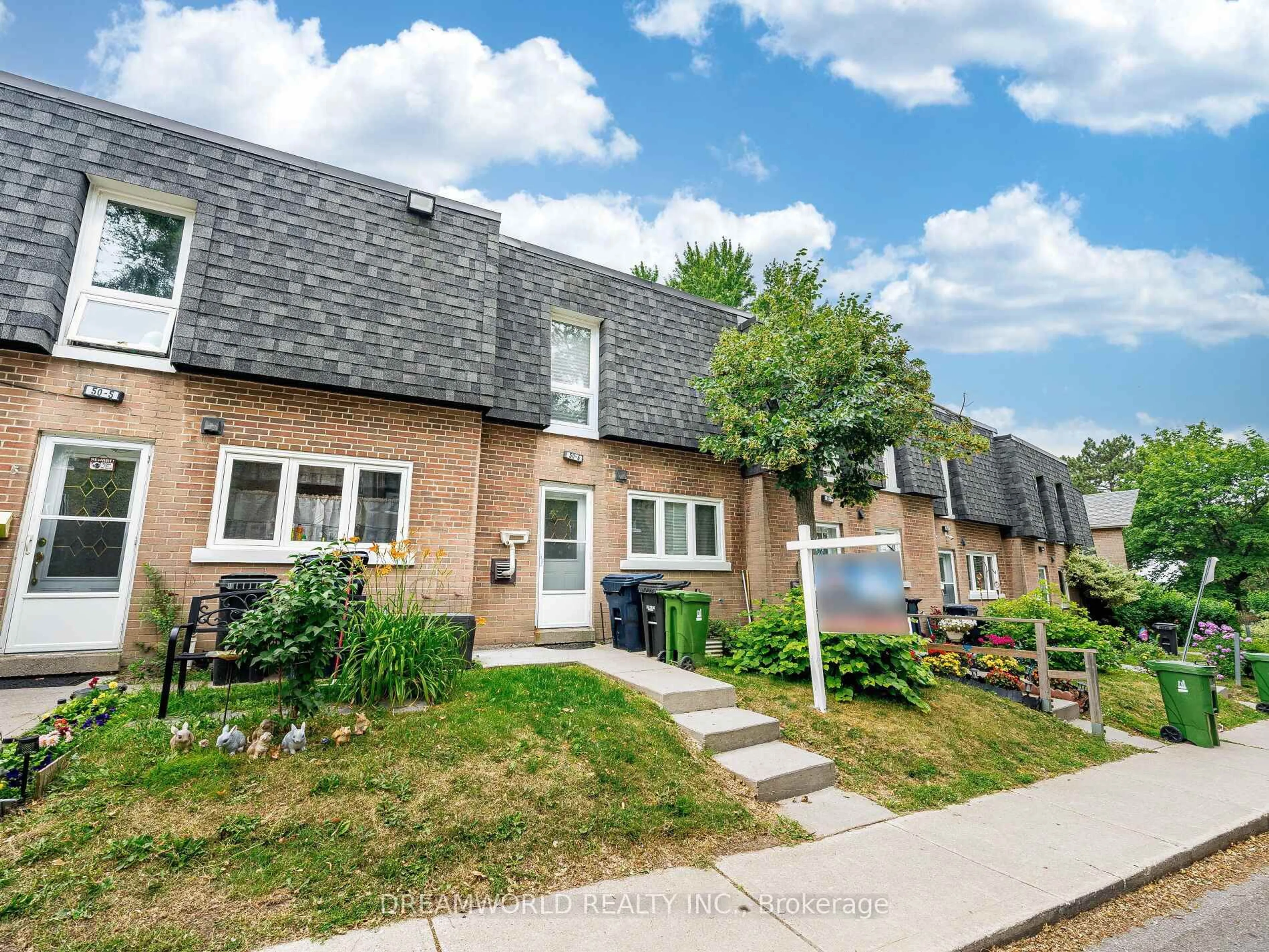 Home with brick exterior material, street for 50 Grandravine Dr #6, Toronto Ontario M3J 1B1
