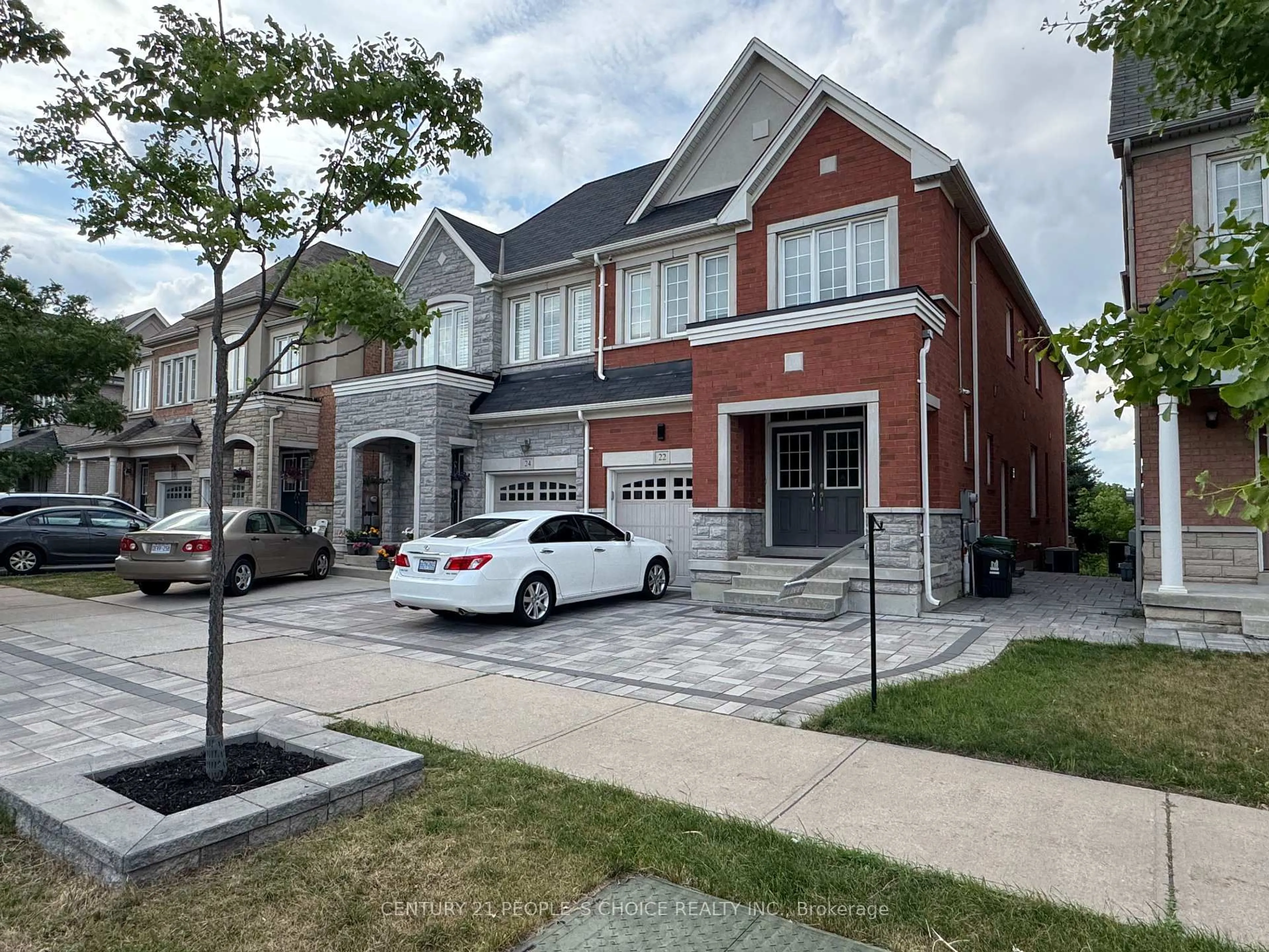 Home with brick exterior material, street for 22 Westowanis Dr, Toronto Ontario M9W 0C2