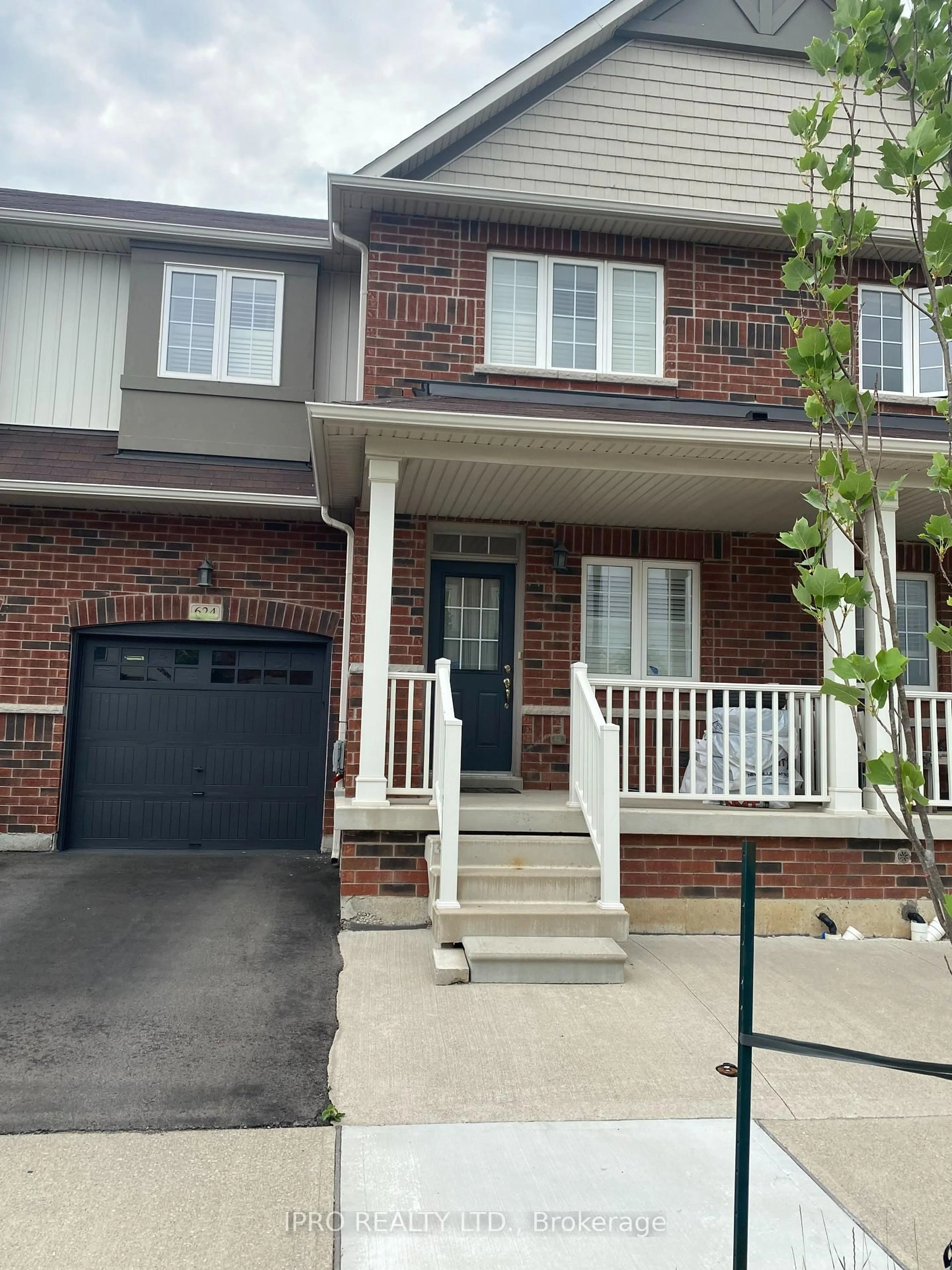 Home with brick exterior material, street for 624 Murray Meadows Pl, Milton Ontario L9T 8L7
