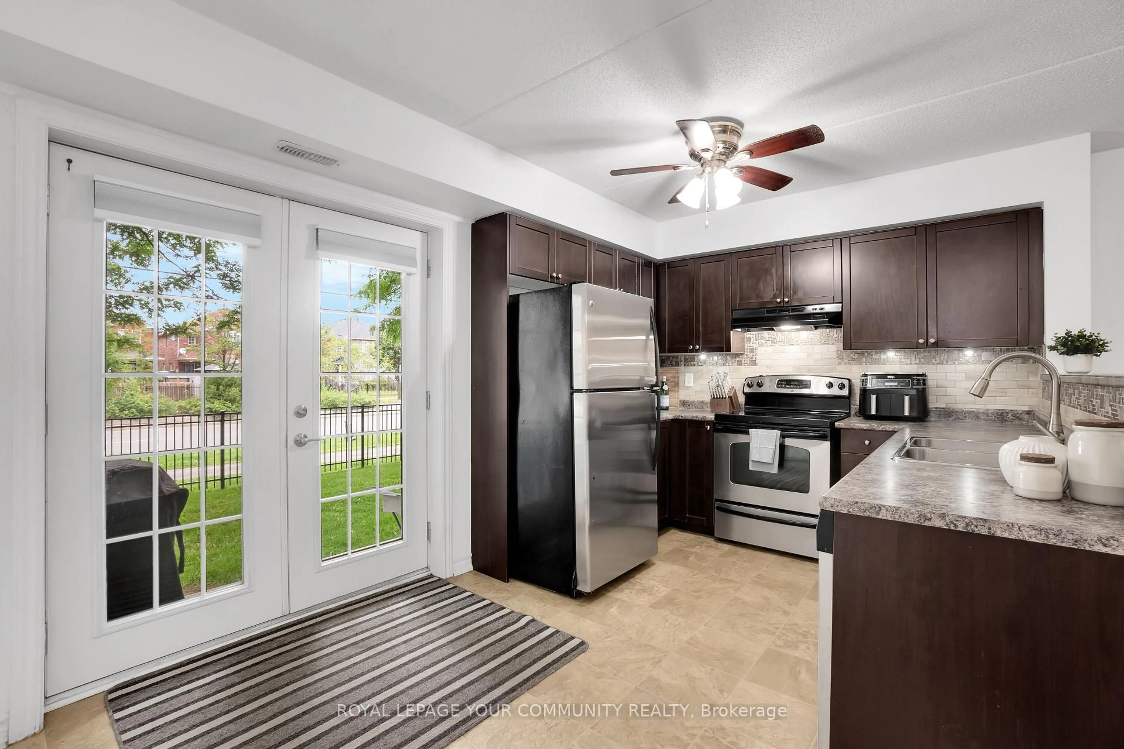 Open concept kitchen, ceramic/tile floor for 1360 Main St #101, Milton Ontario L9T 7S5