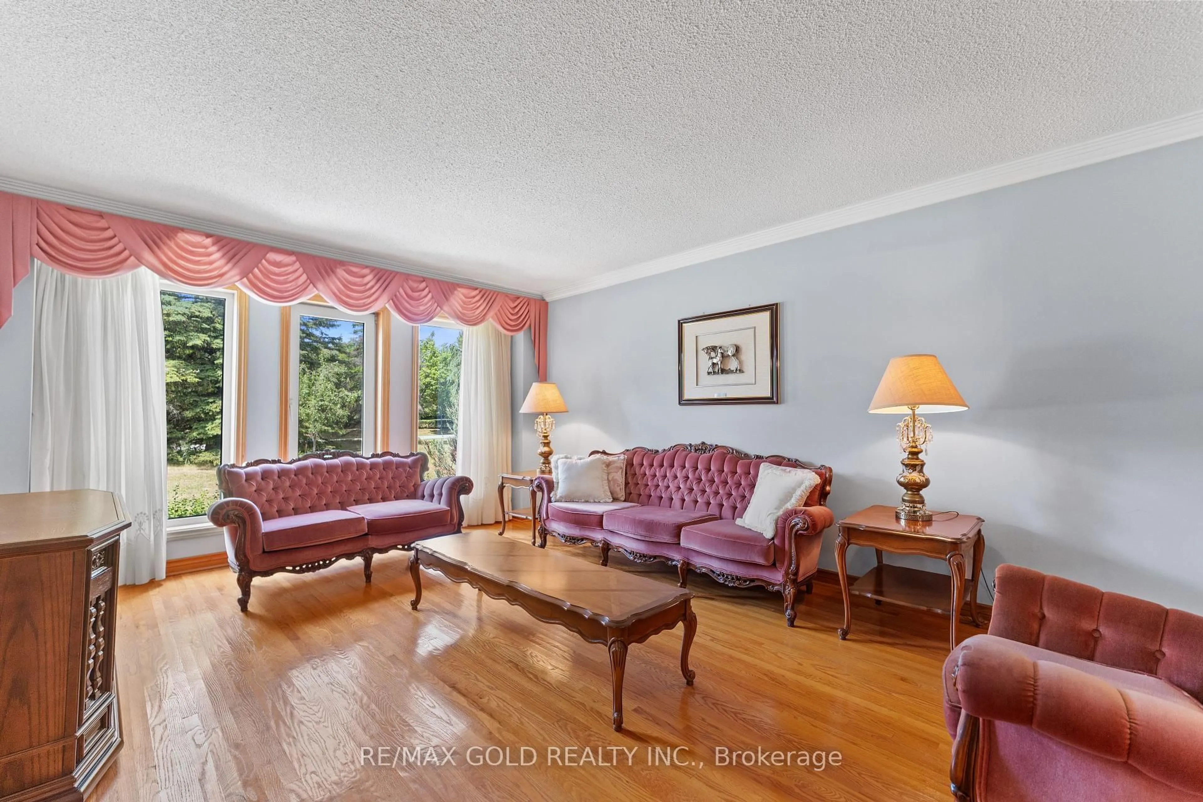 Living room with furniture, unknown for 8 Ryckman Lane, Brampton Ontario L6P 0C7