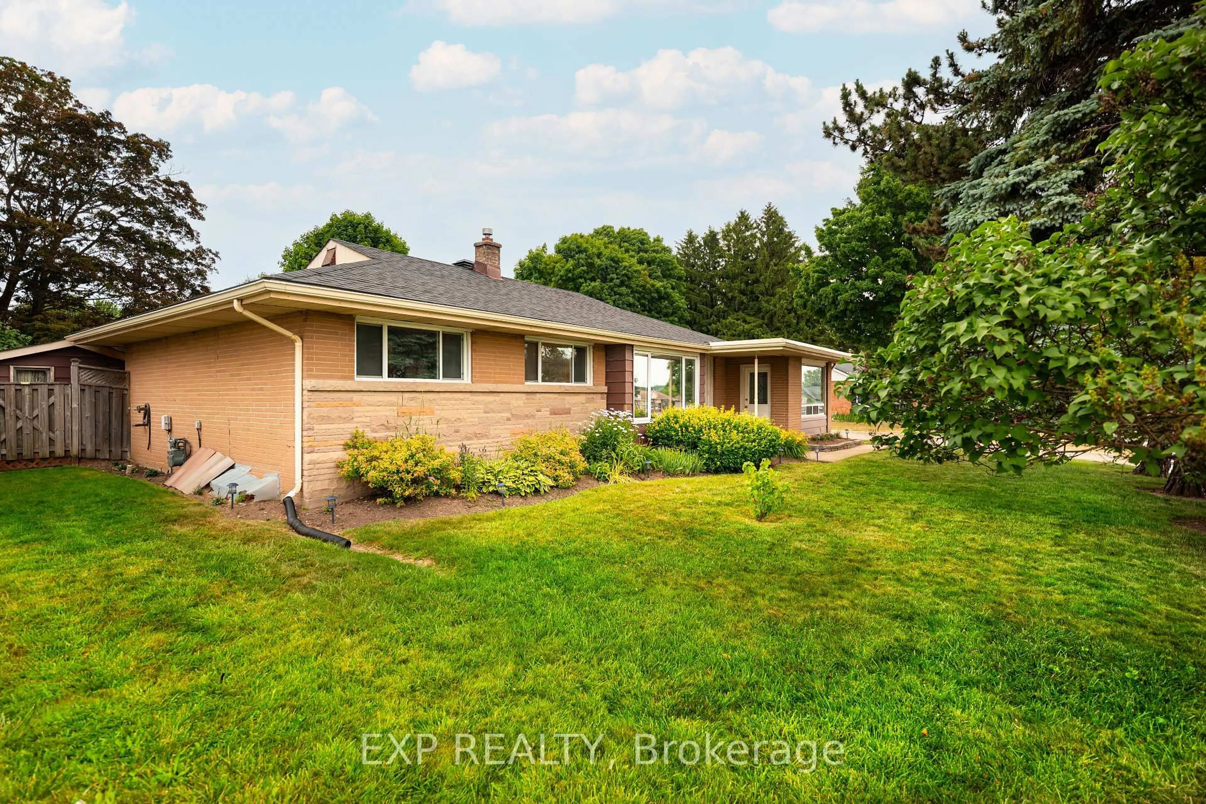 A pic from outside/outdoor area/front of a property/back of a property/a pic from drone, water/lake/river/ocean view for 1 Banting Dr, Orangeville Ontario L9W 2J5