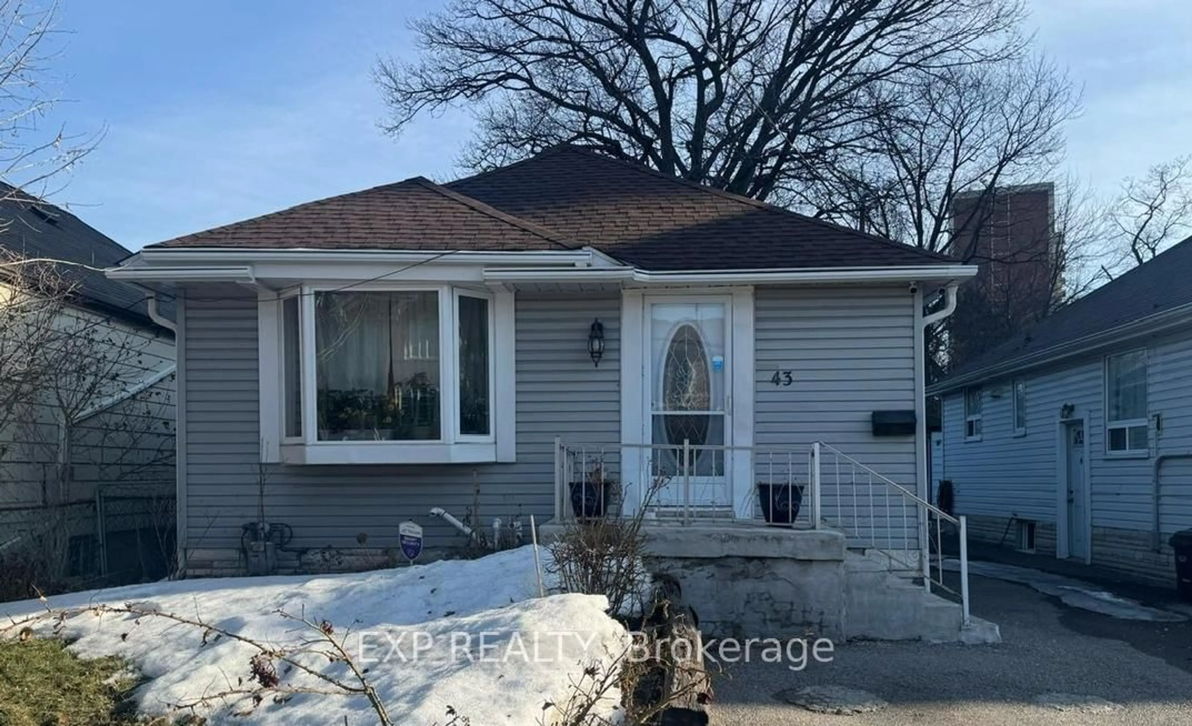 Home with vinyl exterior material, street for 43 Harding Ave, Toronto Ontario M6M 3A3