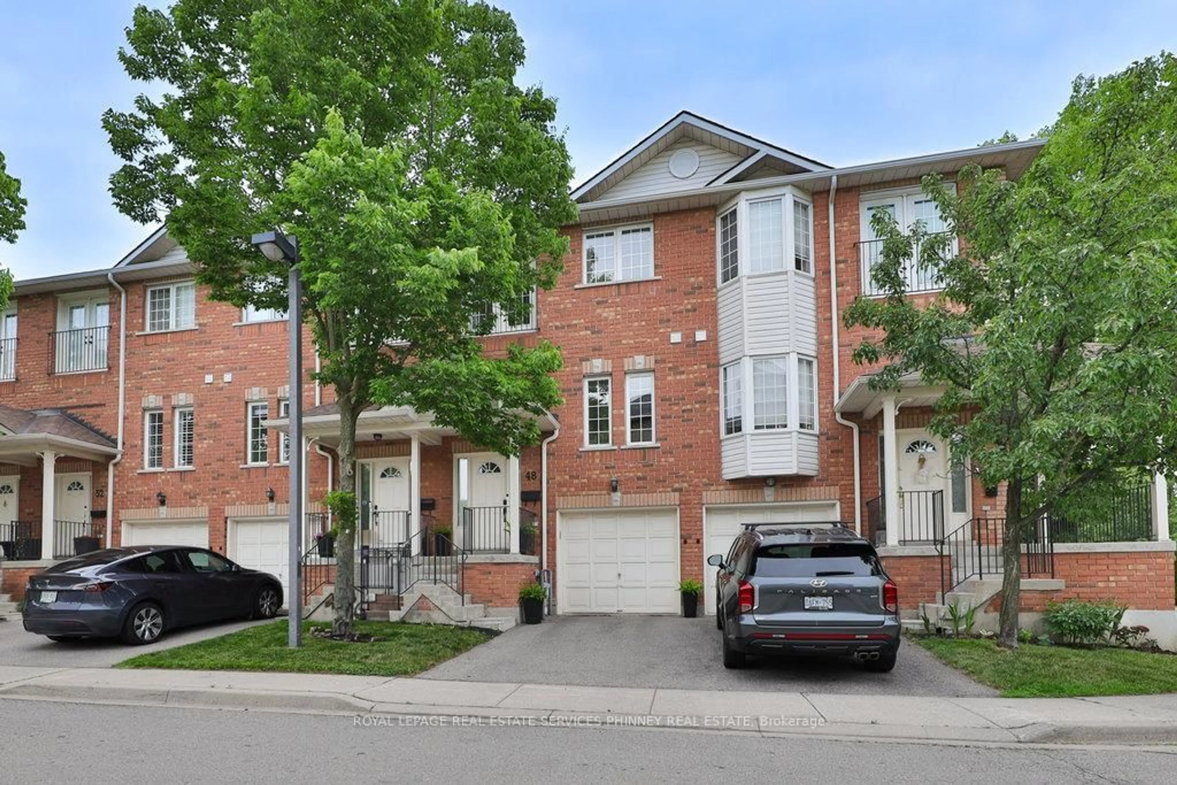 Home with brick exterior material, street for 1130 Cawthra Rd #48, Mississauga Ontario L5G 4V7