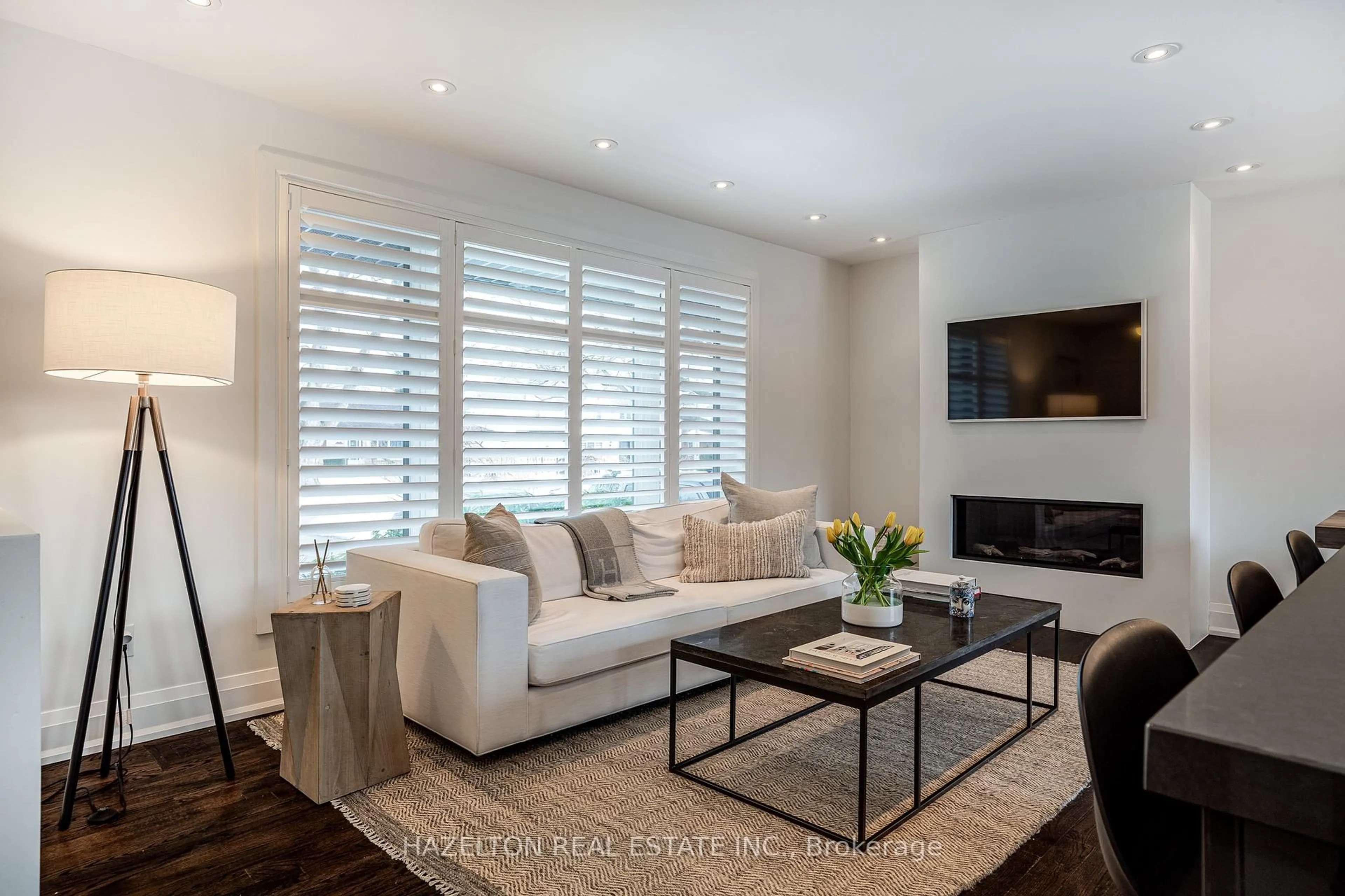 Living room with furniture, wood/laminate floor for 1171 Tisdale St, Oakville Ontario L6L 2S9