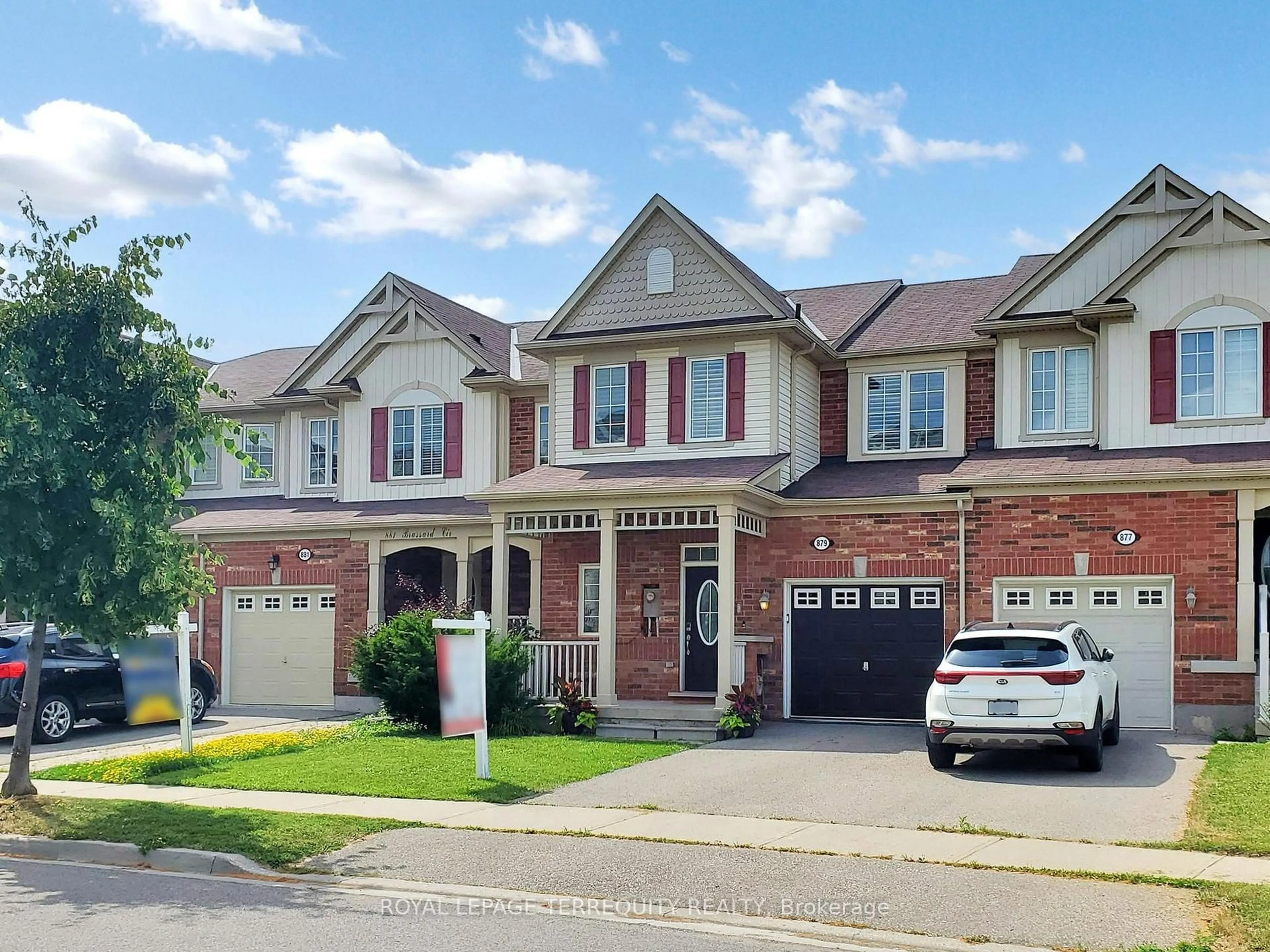 Home with brick exterior material, street for 879 Brassard Circ, Milton Ontario L9T 8E2