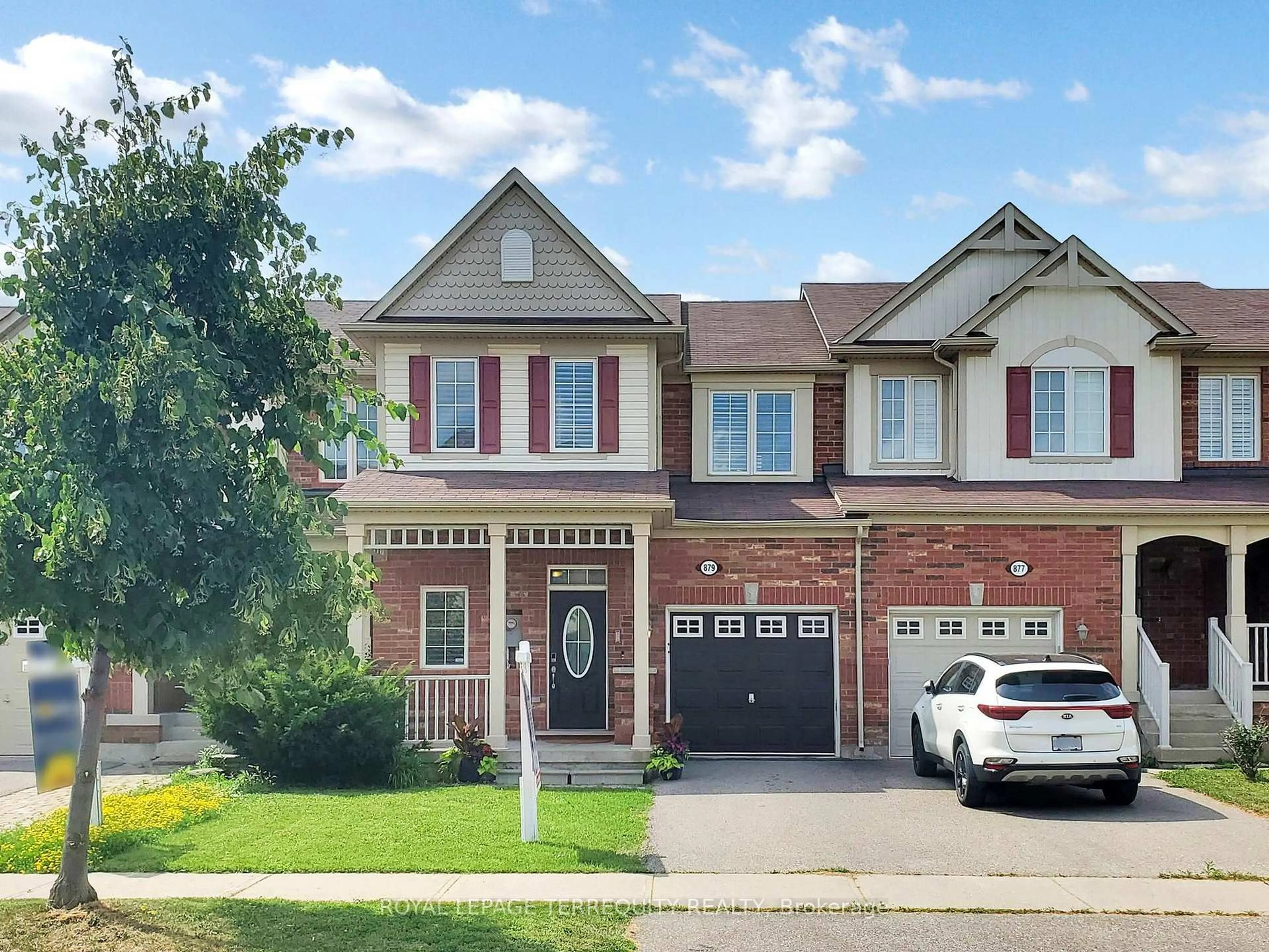 Home with brick exterior material, street for 879 Brassard Circ, Milton Ontario L9T 8E2