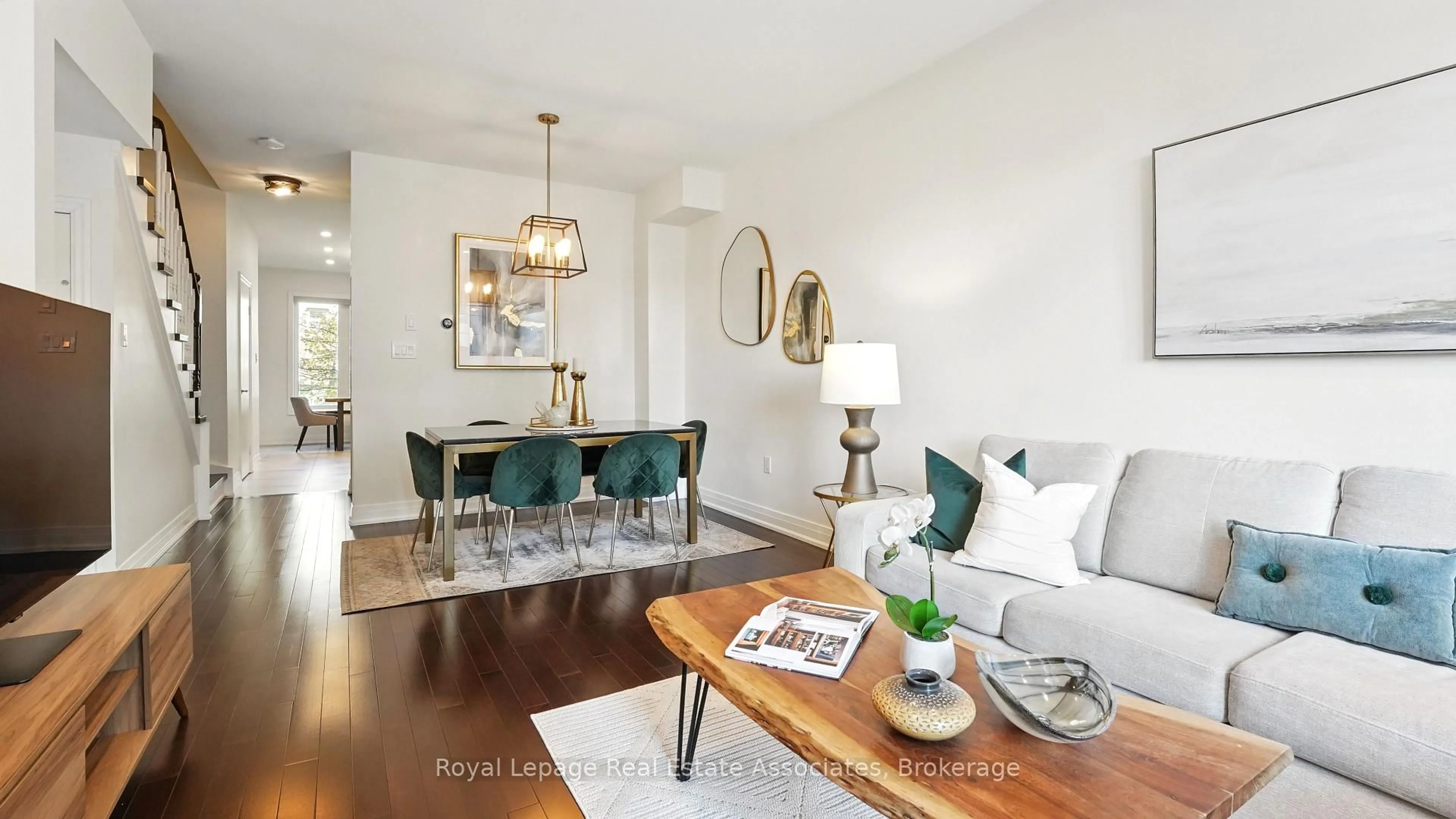 Living room with furniture, wood/laminate floor for 1355 Rathburn Rd #35, Mississauga Ontario L4W 5R5