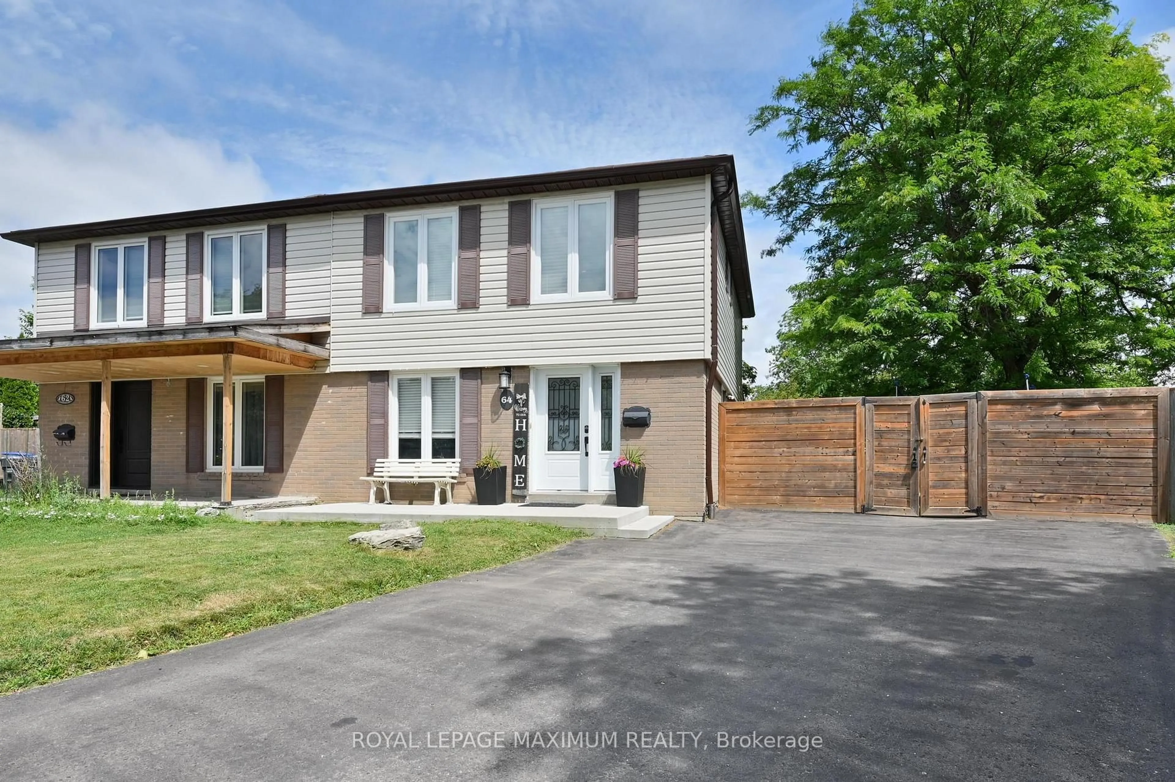 Home with brick exterior material, street for 64 Glenmore Cres, Brampton Ontario L6S 1H8