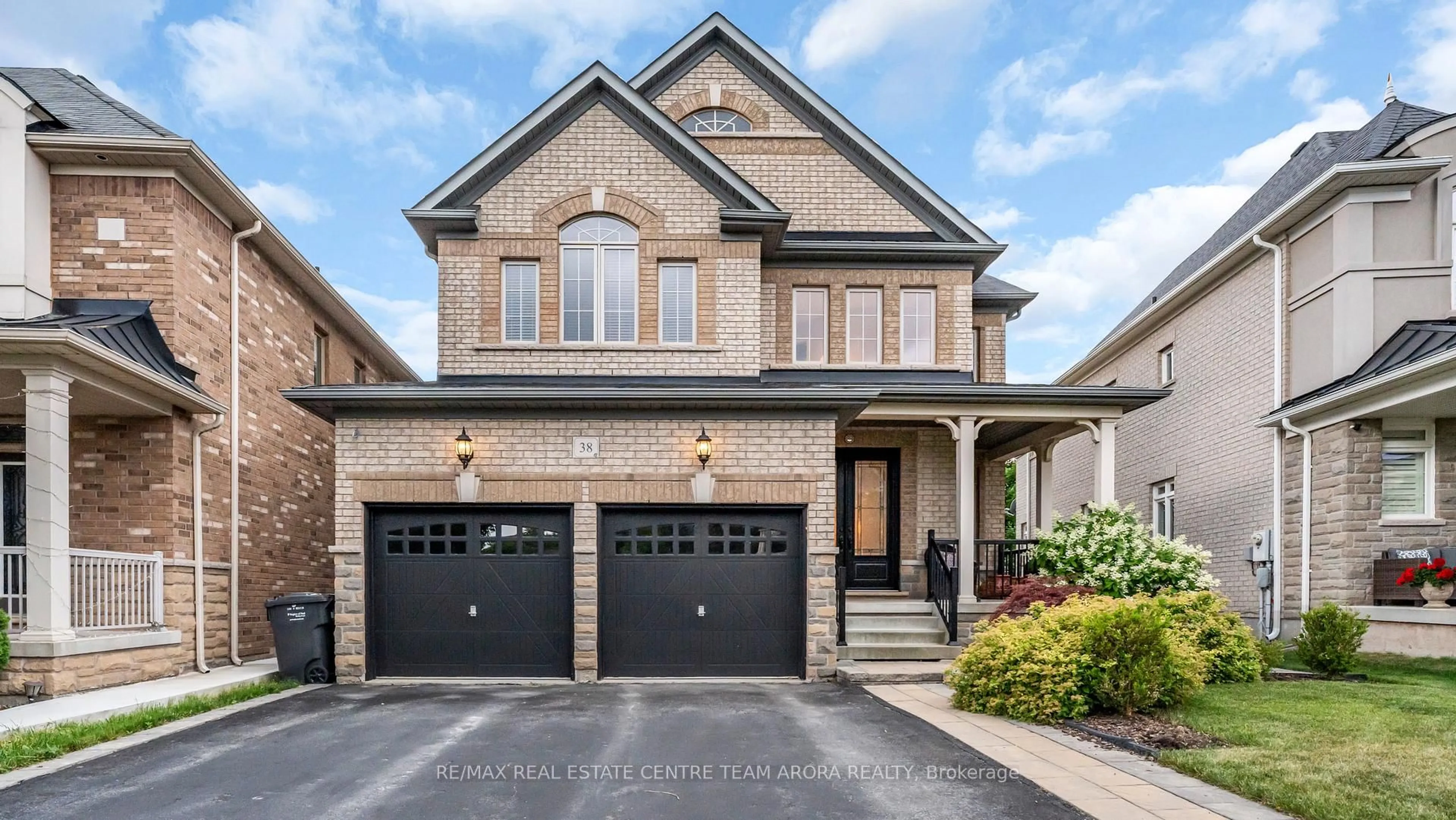 Home with brick exterior material, street for 38 Intrigue Tr, Brampton Ontario L6X 0W9