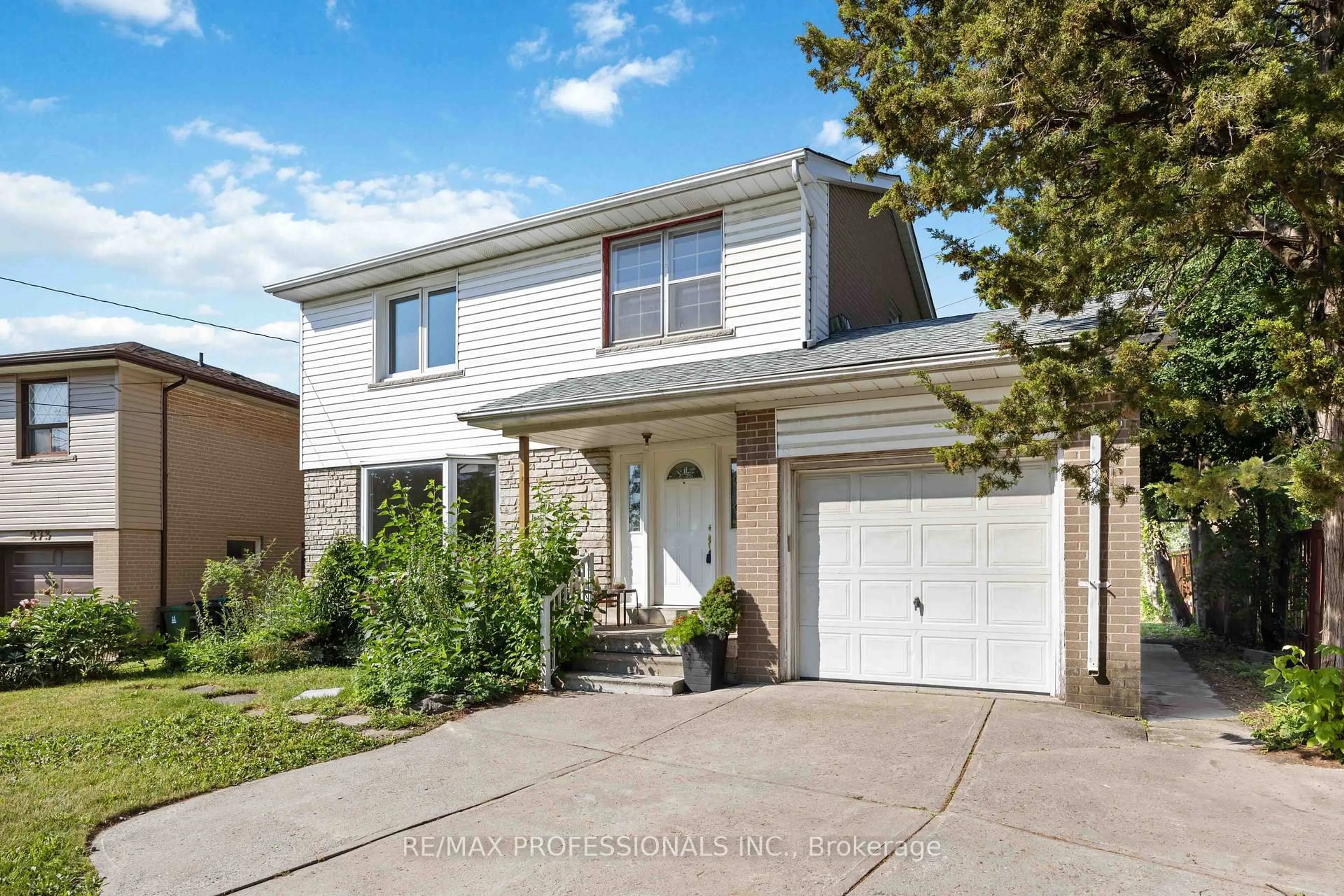 Home with vinyl exterior material, street for 275 Jeffcoat Dr, Toronto Ontario M9W 3E4