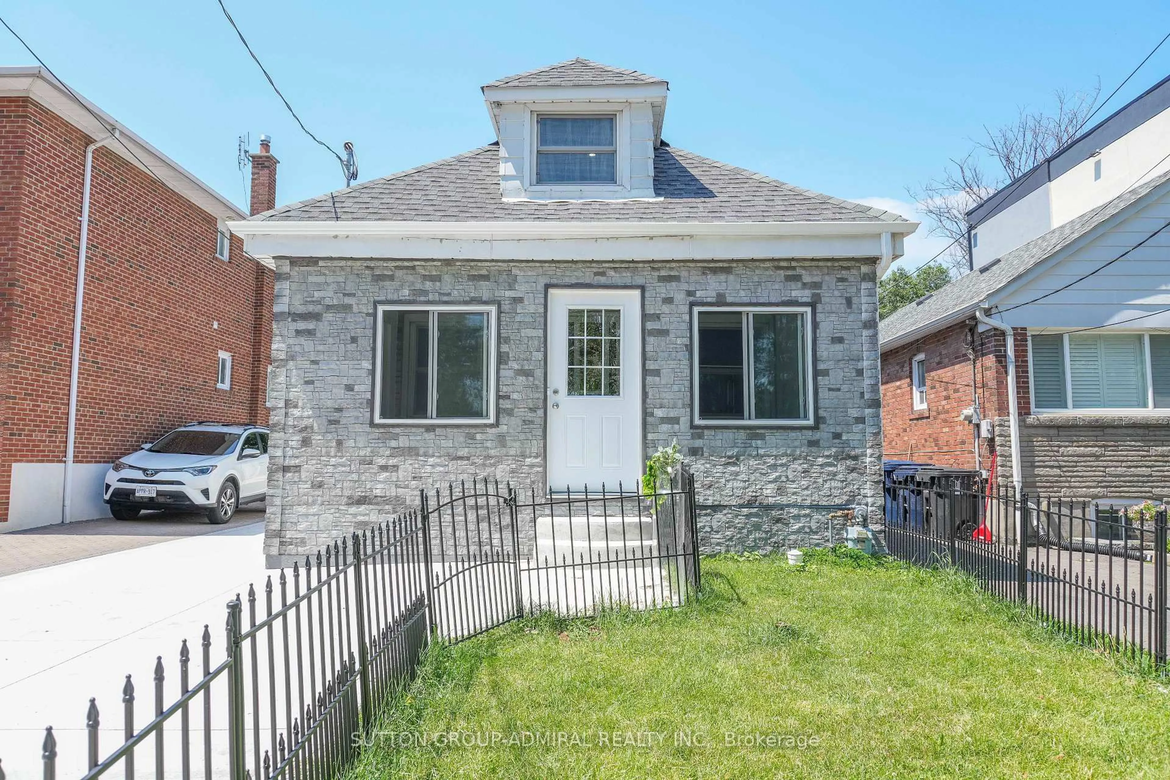 Home with brick exterior material, street for 14 Spears St, Toronto Ontario M6N 3X7
