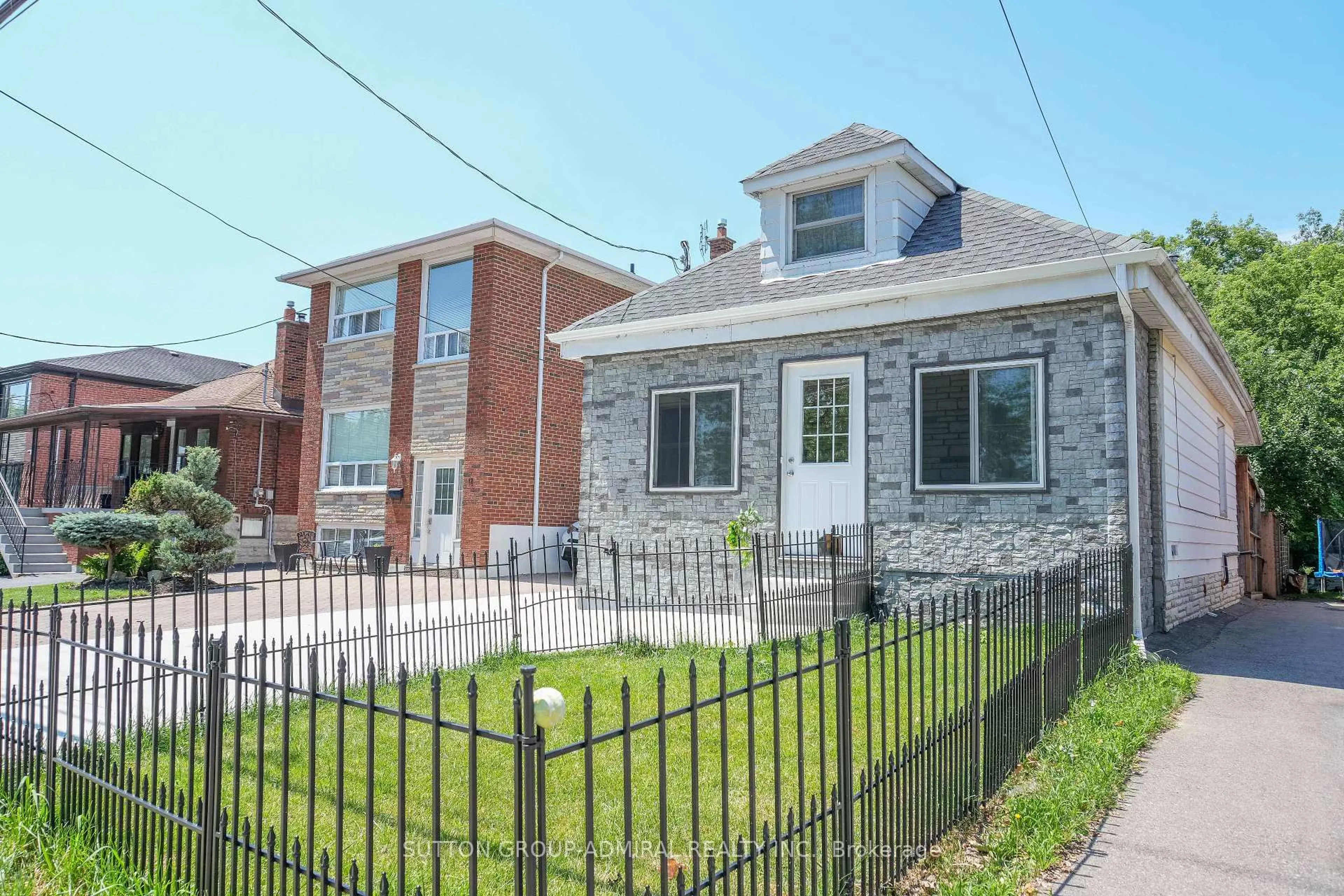 Home with brick exterior material, street for 14 Spears St, Toronto Ontario M6N 3X7