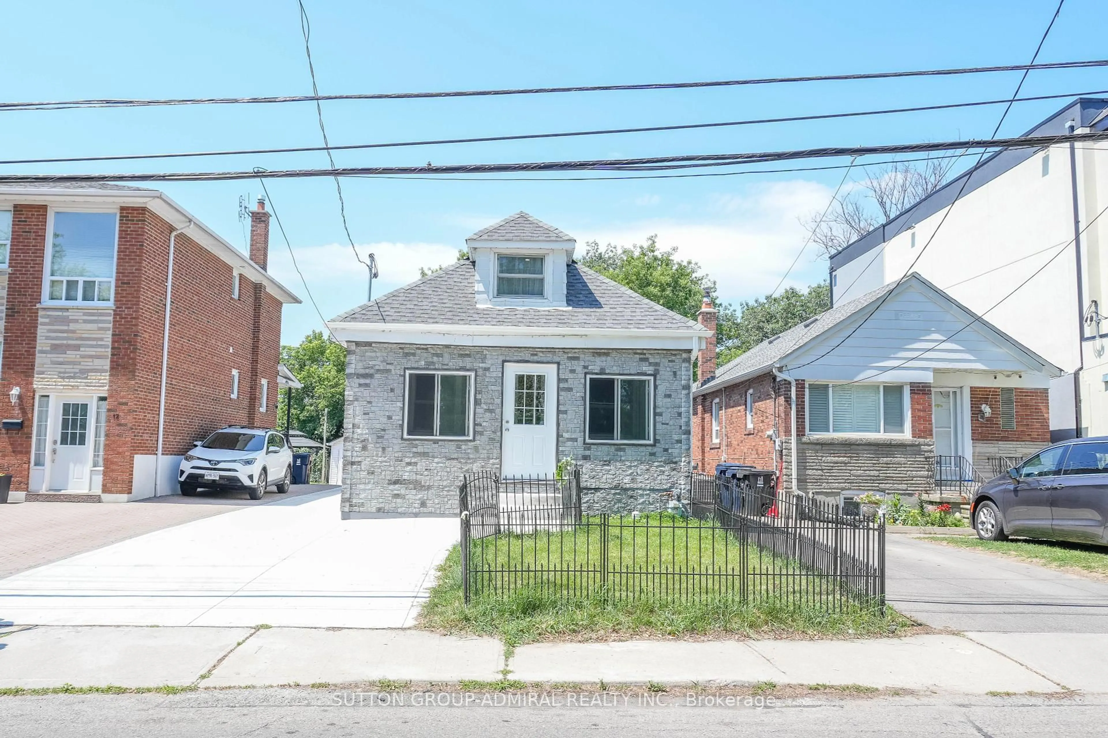 Home with brick exterior material, street for 14 Spears St, Toronto Ontario M6N 3X7