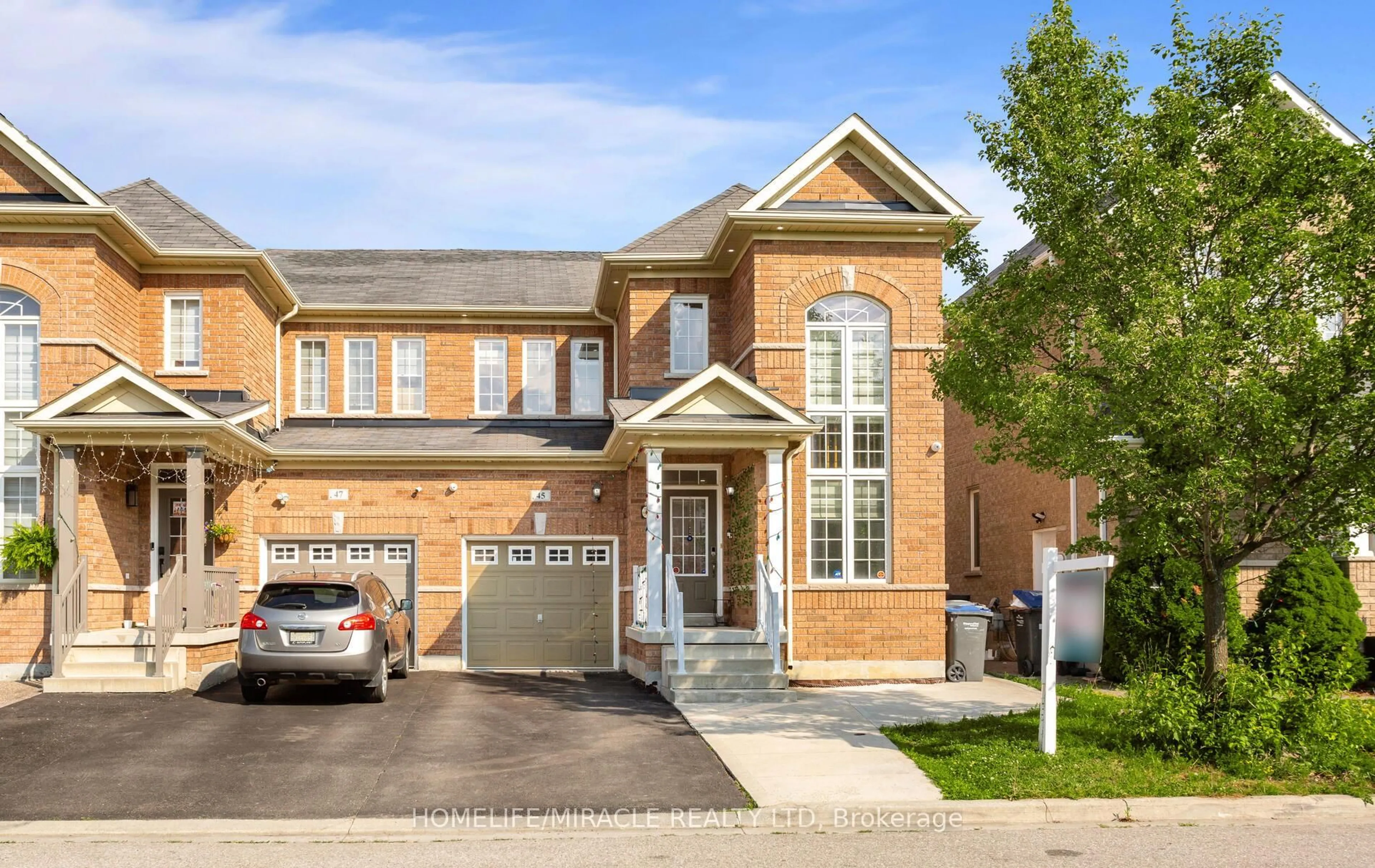 Home with brick exterior material, street for 45 Boundbrook Dr, Brampton Ontario L7A 0M1