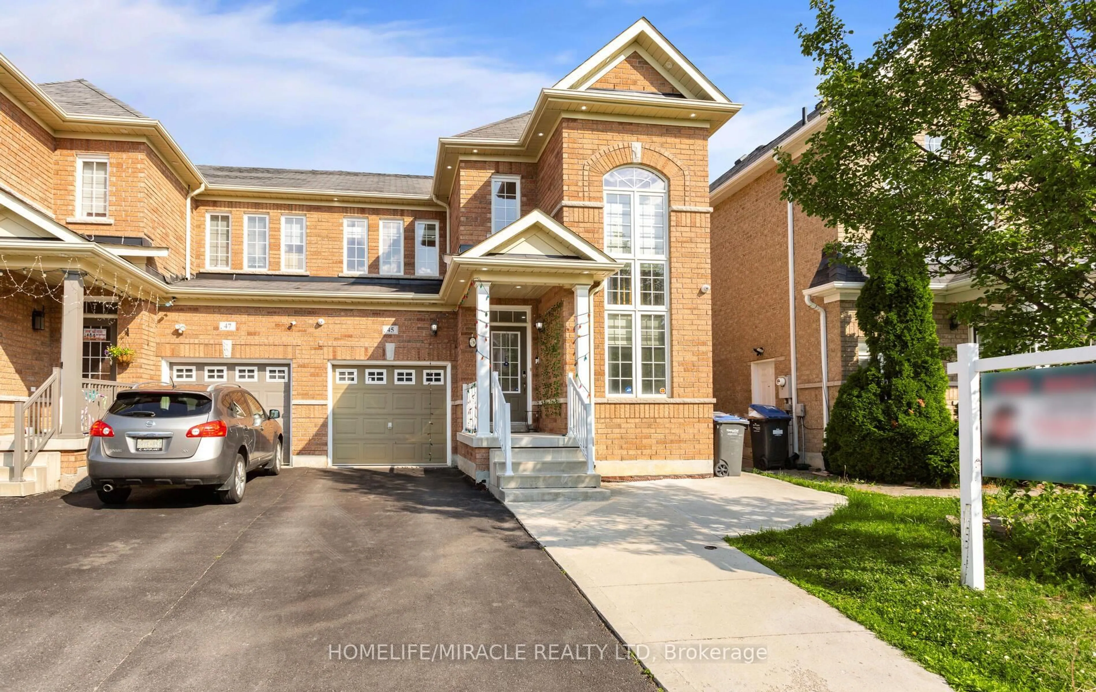 Home with brick exterior material, street for 45 Boundbrook Dr, Brampton Ontario L7A 0M1