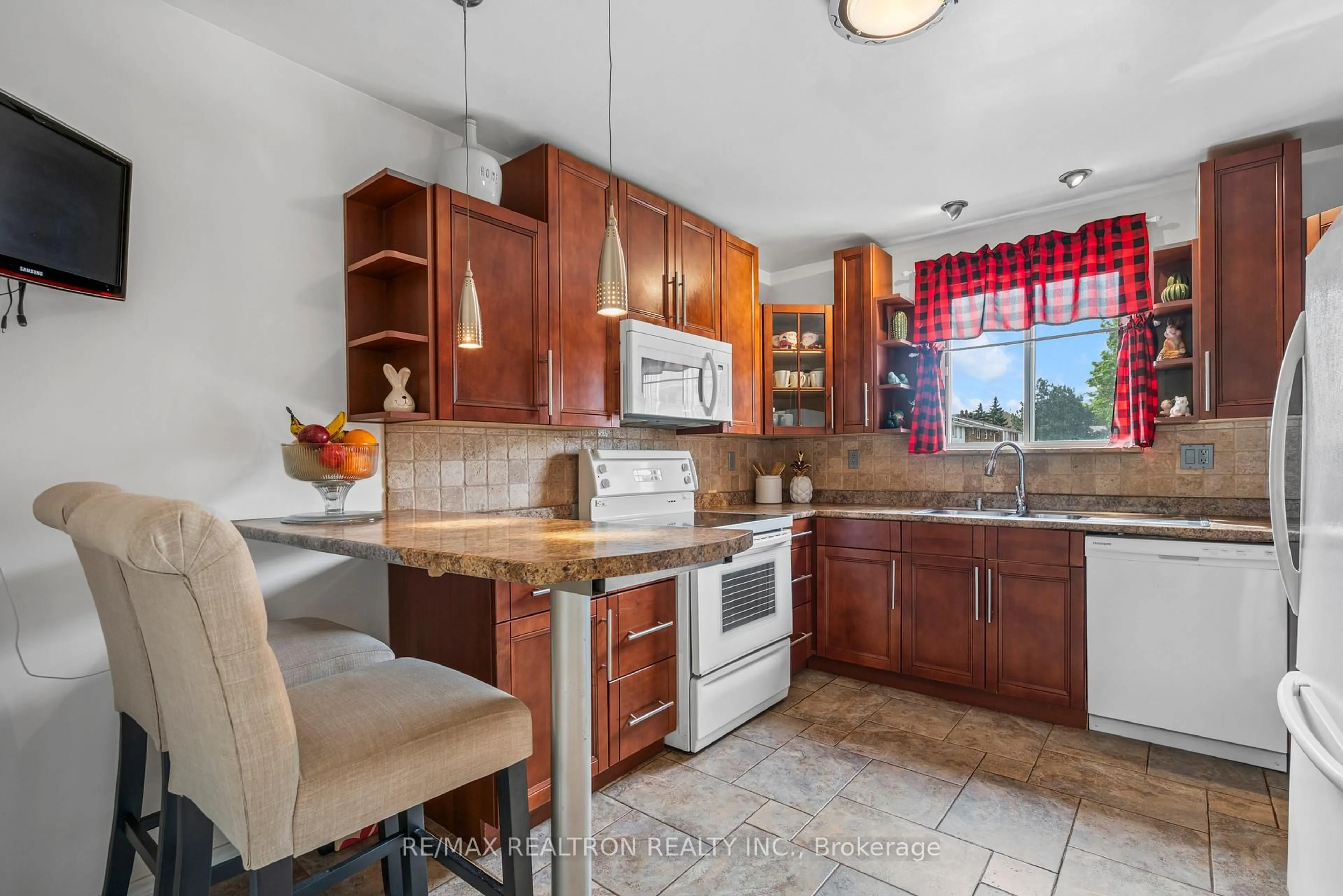 Open concept kitchen, ceramic/tile floor for 19 Centennial Park Rd #10, Toronto Ontario M9C 4W8
