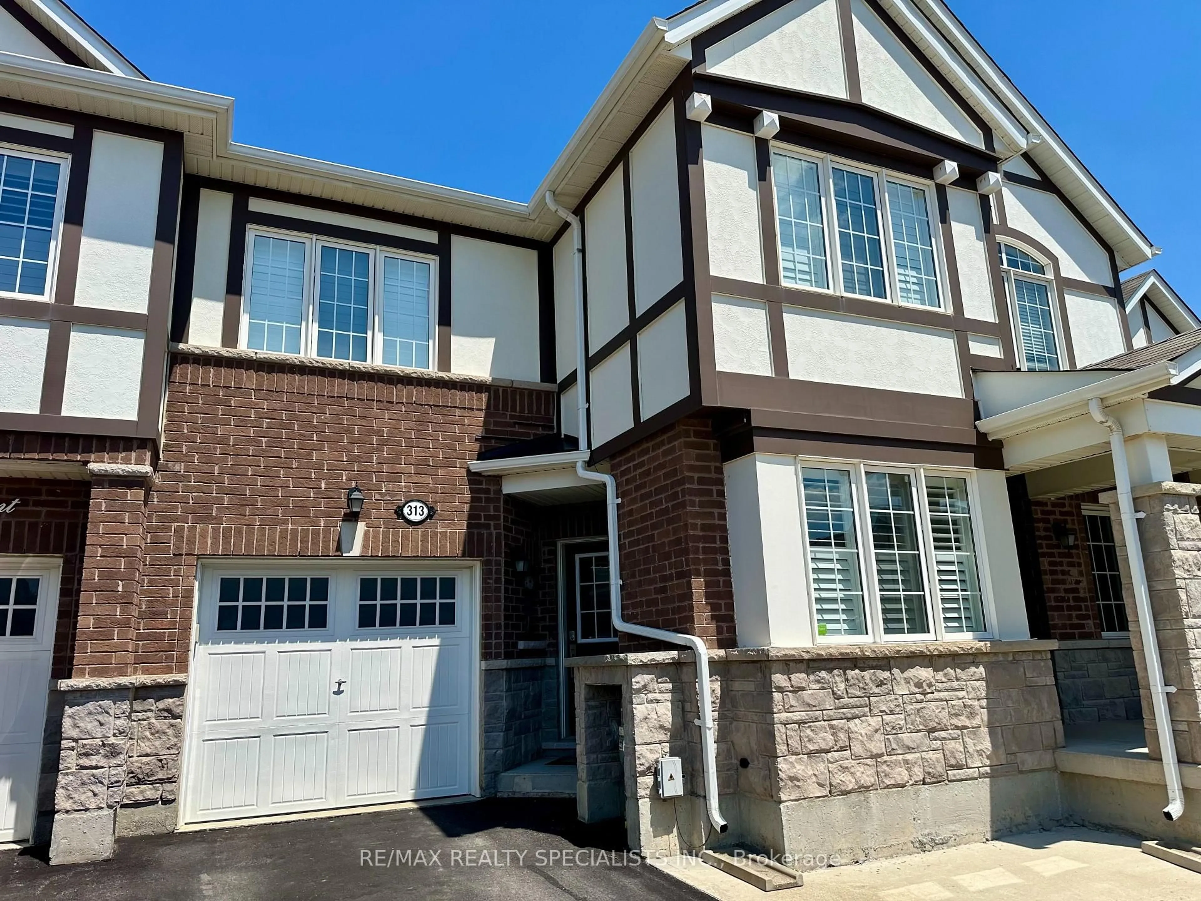 Home with brick exterior material, street for 313 Gooding Cres, Milton Ontario L9E 0A9