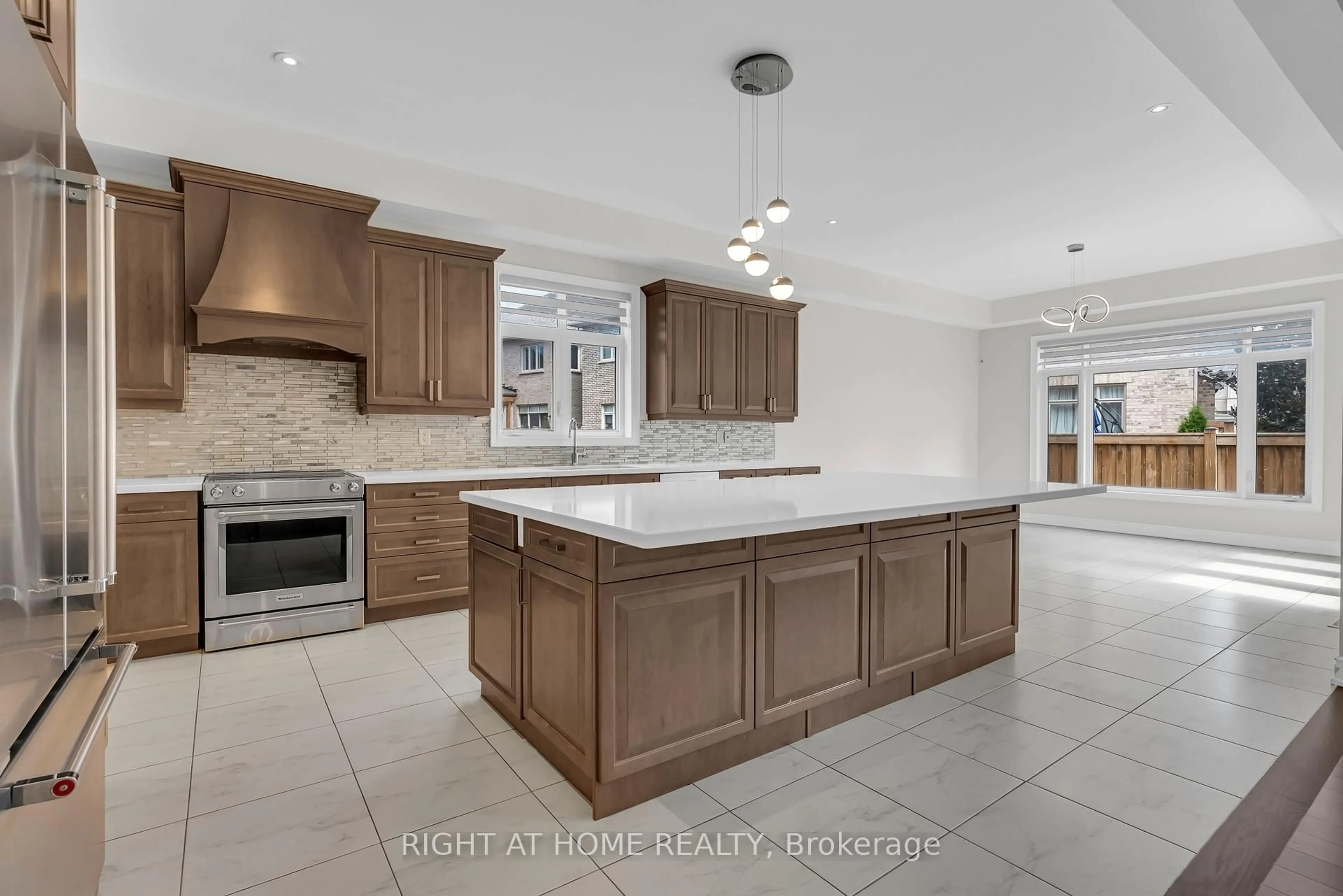 Open concept kitchen, ceramic/tile floor for 3175 Daniel Way, Oakville Ontario L6H 0V1