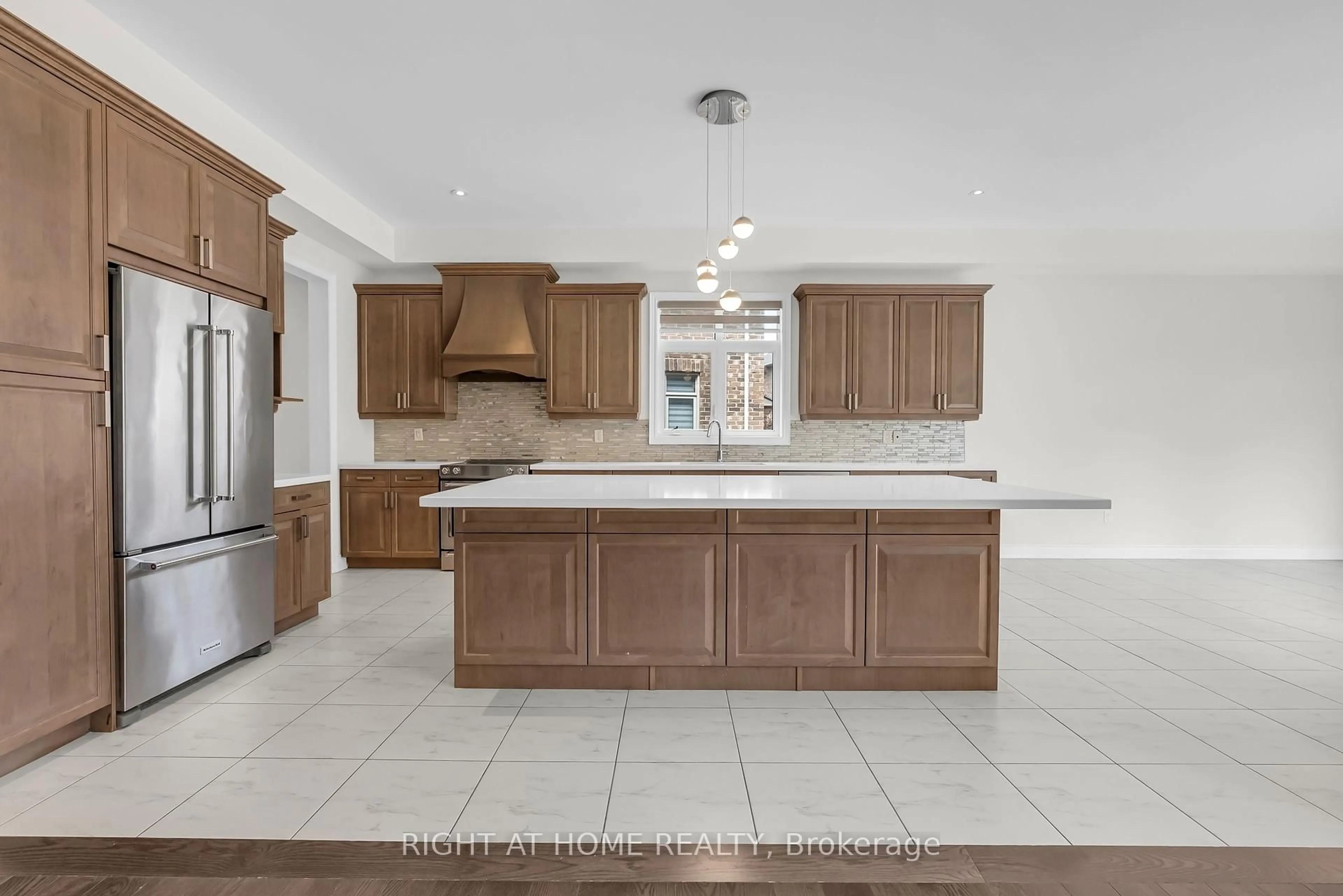 Open concept kitchen, ceramic/tile floor for 3175 Daniel Way, Oakville Ontario L6H 0V1