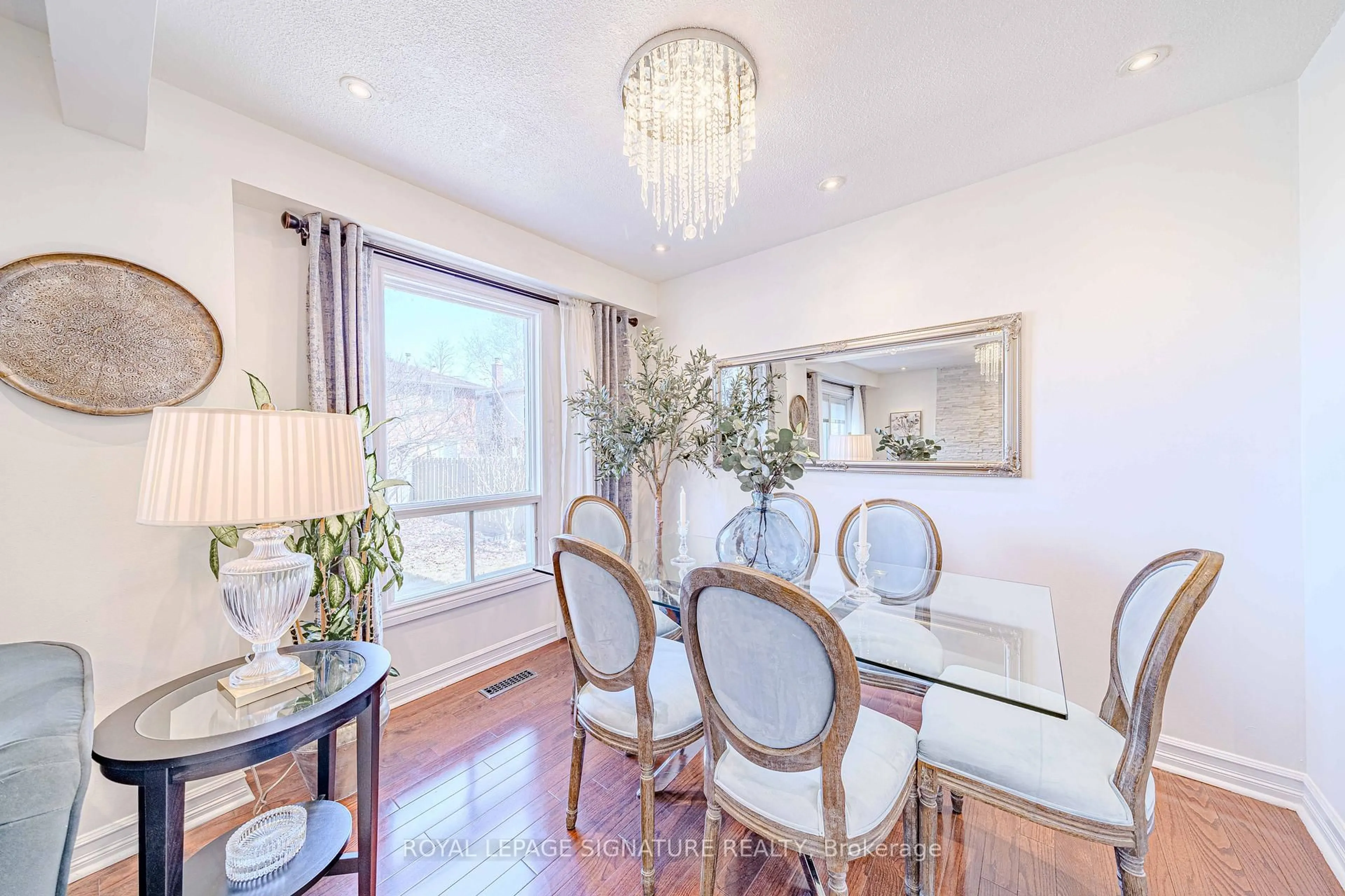 Dining room, wood/laminate floor for 2 Summertime Crt, Brampton Ontario L6Z 2B4