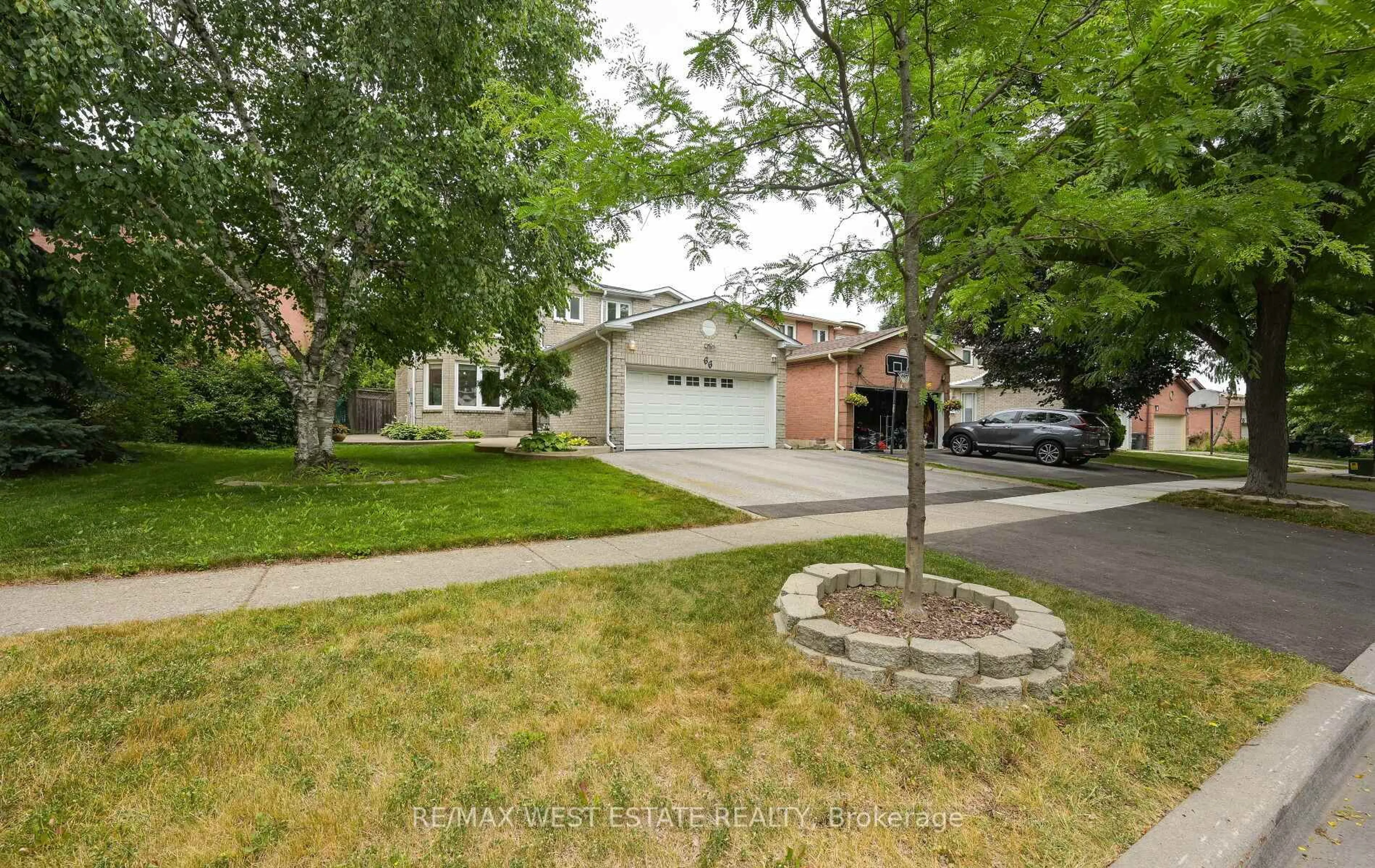 A pic from outside/outdoor area/front of a property/back of a property/a pic from drone, street for 66 La France Rd, Brampton Ontario L6S 4R2
