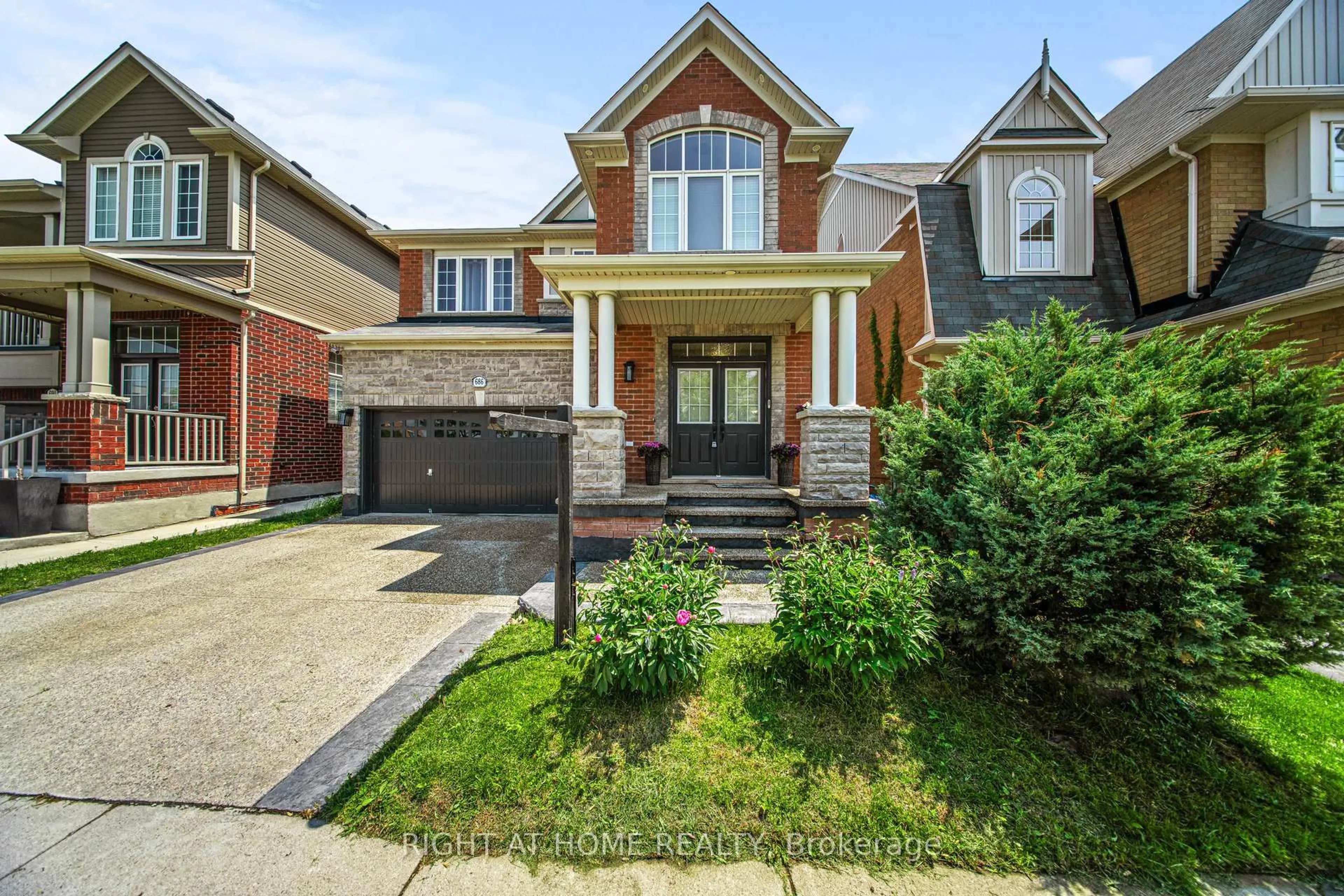 Home with brick exterior material, street for 686 Bolingbroke Dr, Milton Ontario L9T 6Z3