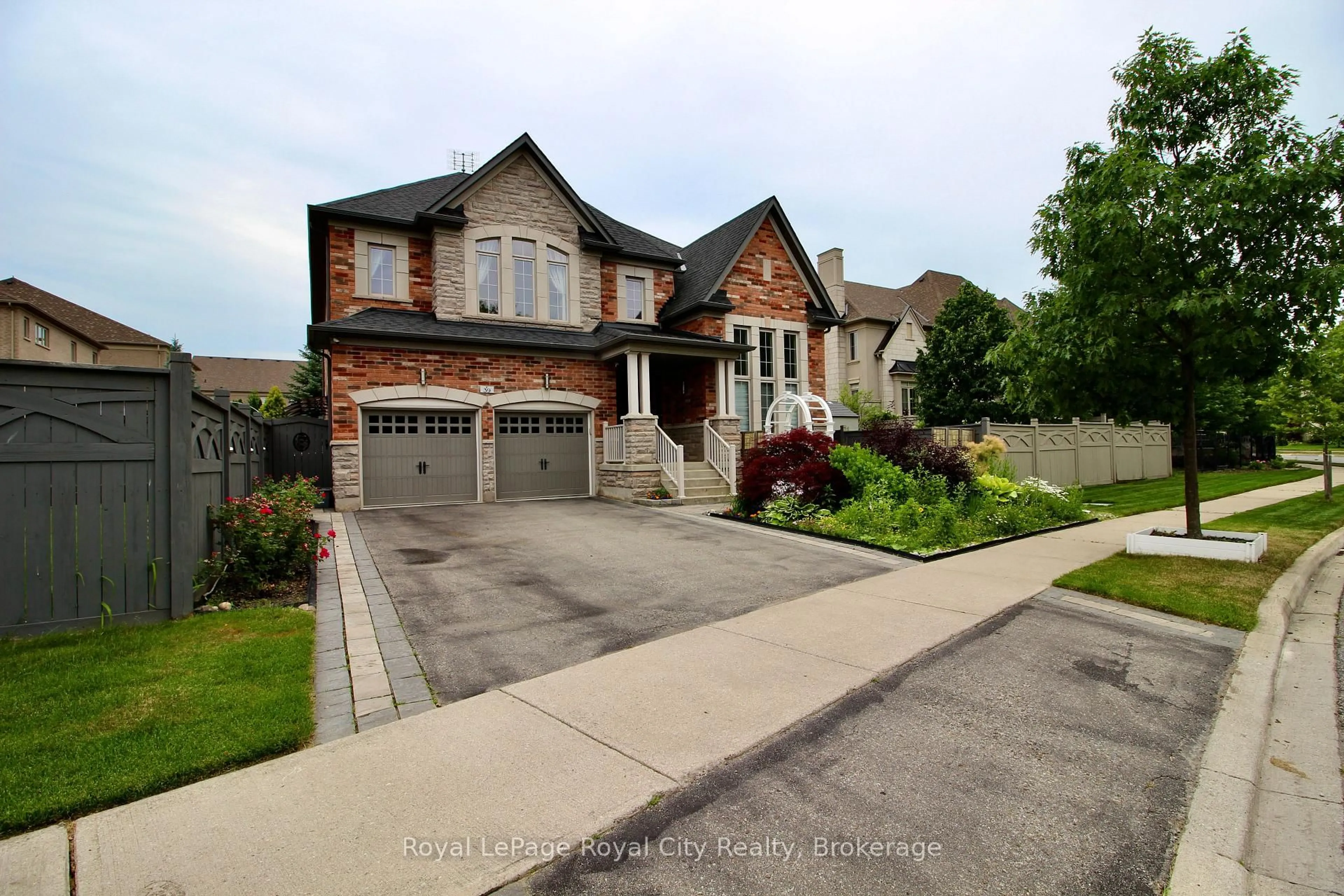 Home with brick exterior material, street for 39 Dalmeny Dr, Brampton Ontario L6X 2Y4