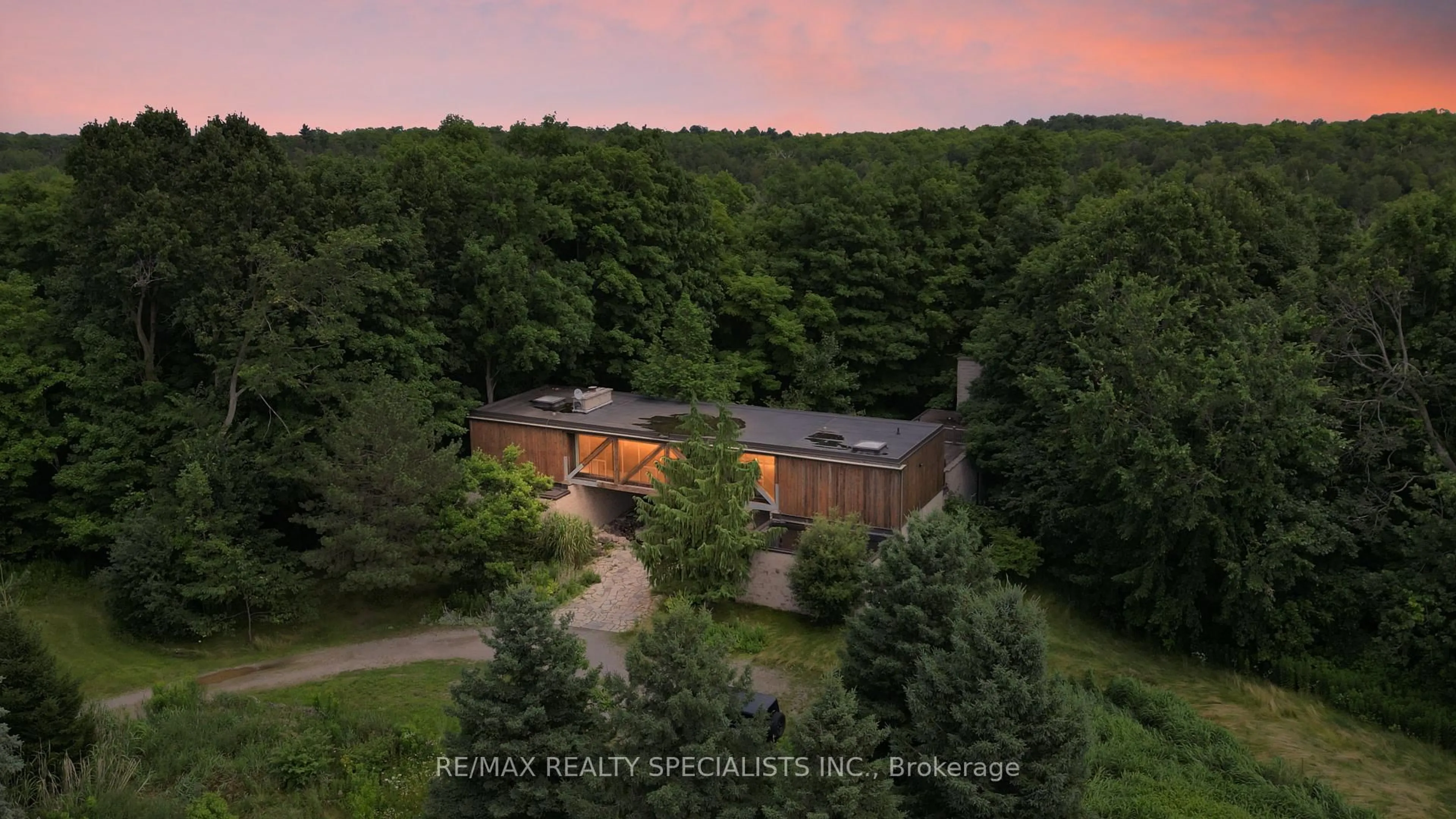 A pic from outside/outdoor area/front of a property/back of a property/a pic from drone, forest/trees view for 15139 Rockside Rd, Caledon Ontario L7C 1V4