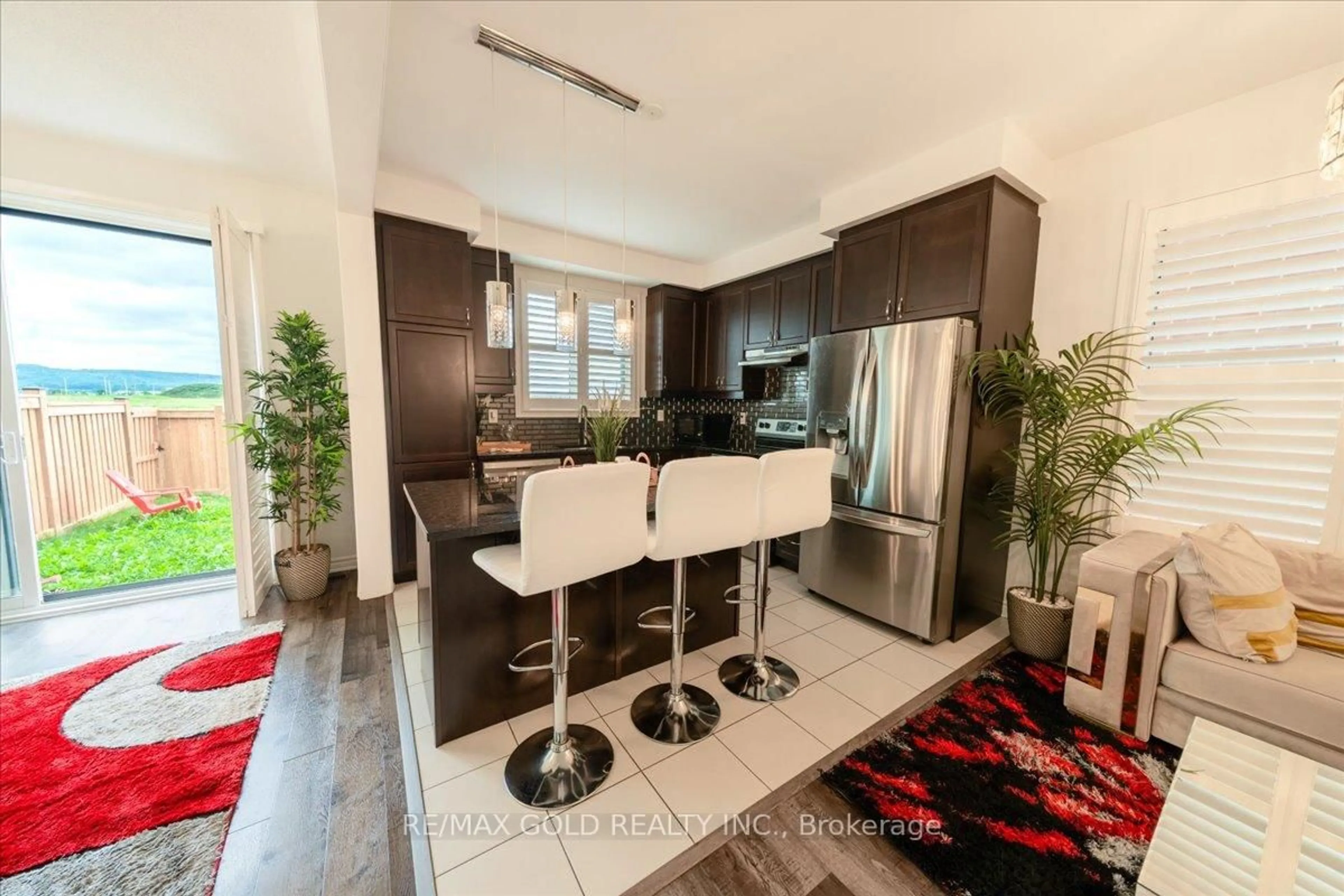 Open concept kitchen, ceramic/tile floor for 451 GORDON KRANTZ Ave, Milton Ontario L9E 1W1