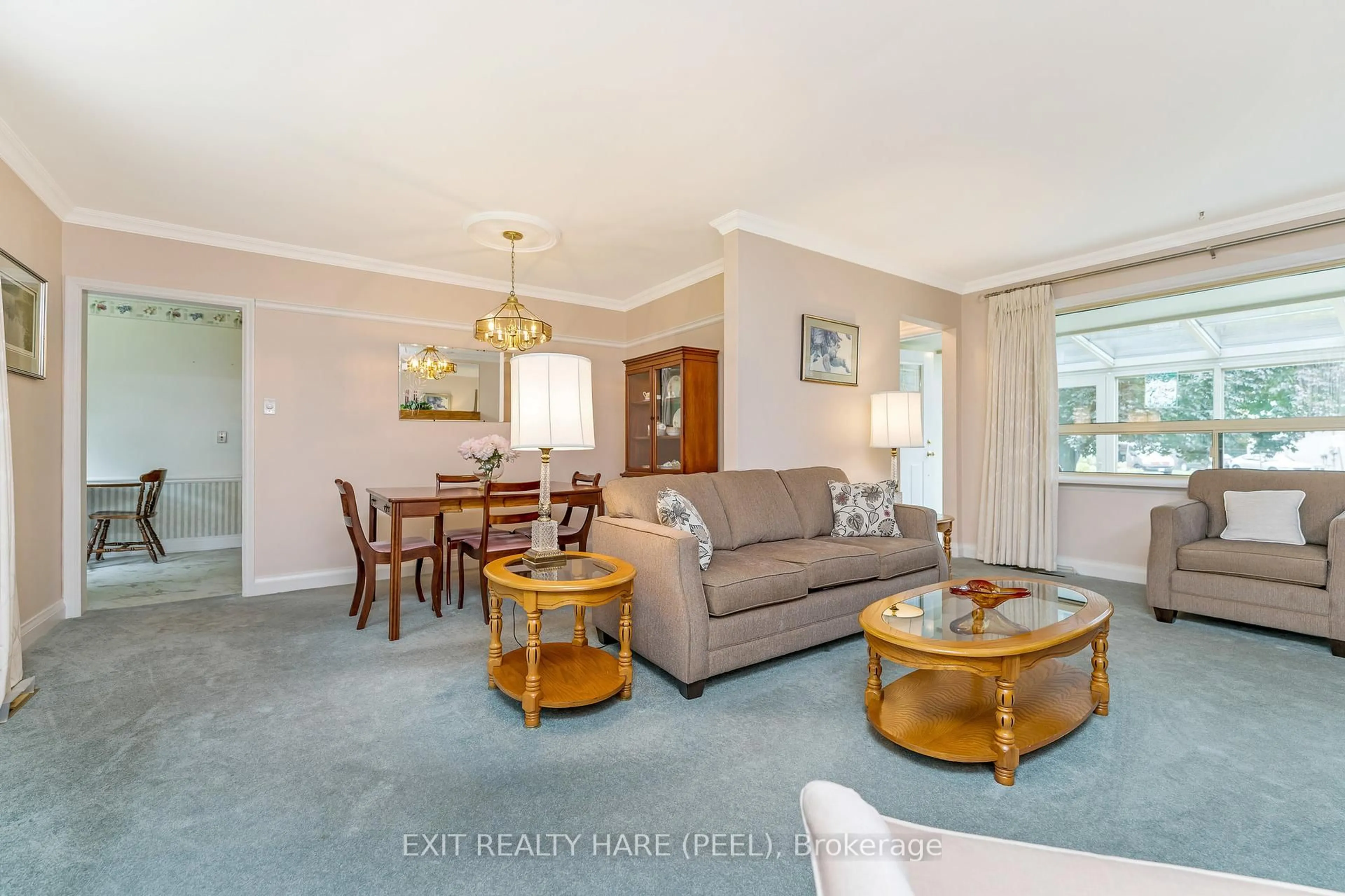 Living room with furniture, unknown for 4 Moore Cres, Brampton Ontario L6W 1W8