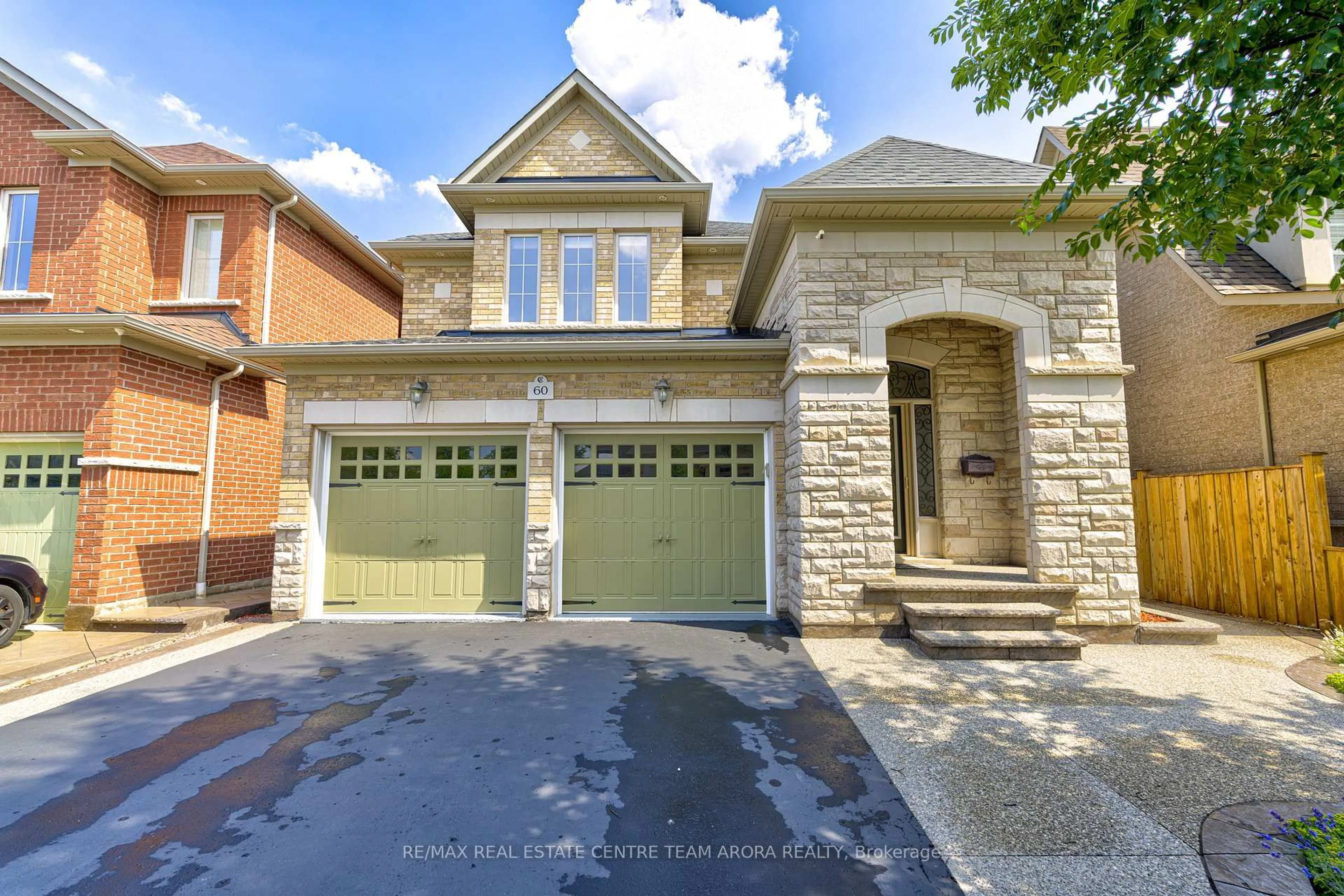 Home with brick exterior material, street for 60 Impulse Circ, Brampton Ontario L6X 0X9
