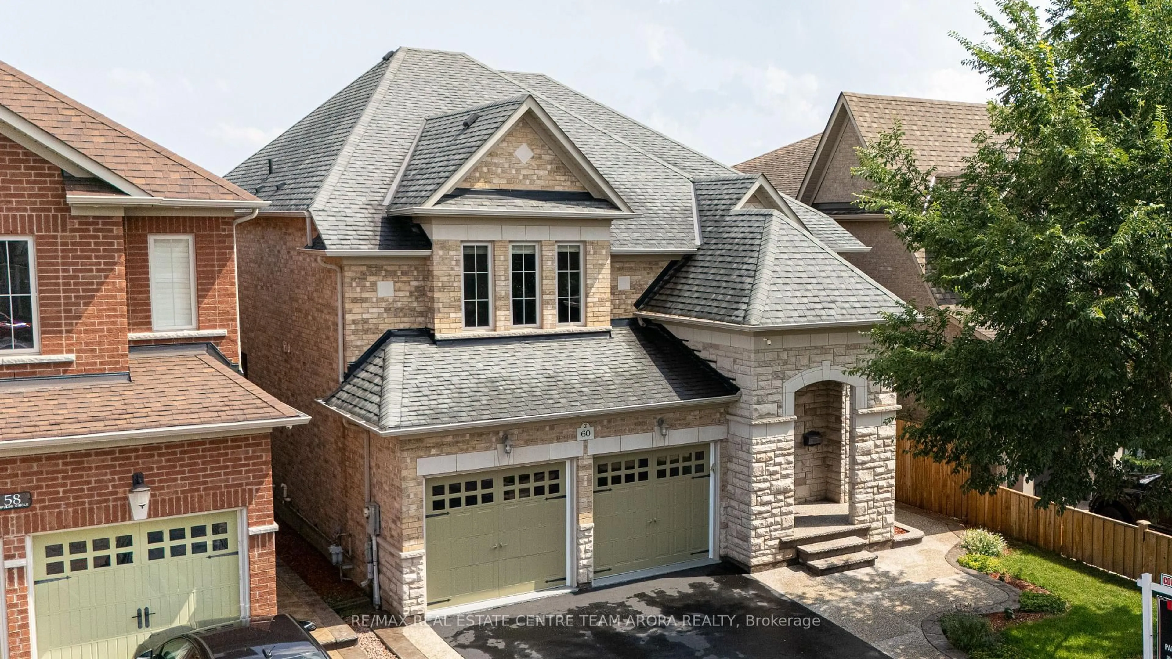 Home with brick exterior material, street for 60 Impulse Circ, Brampton Ontario L6X 0X9