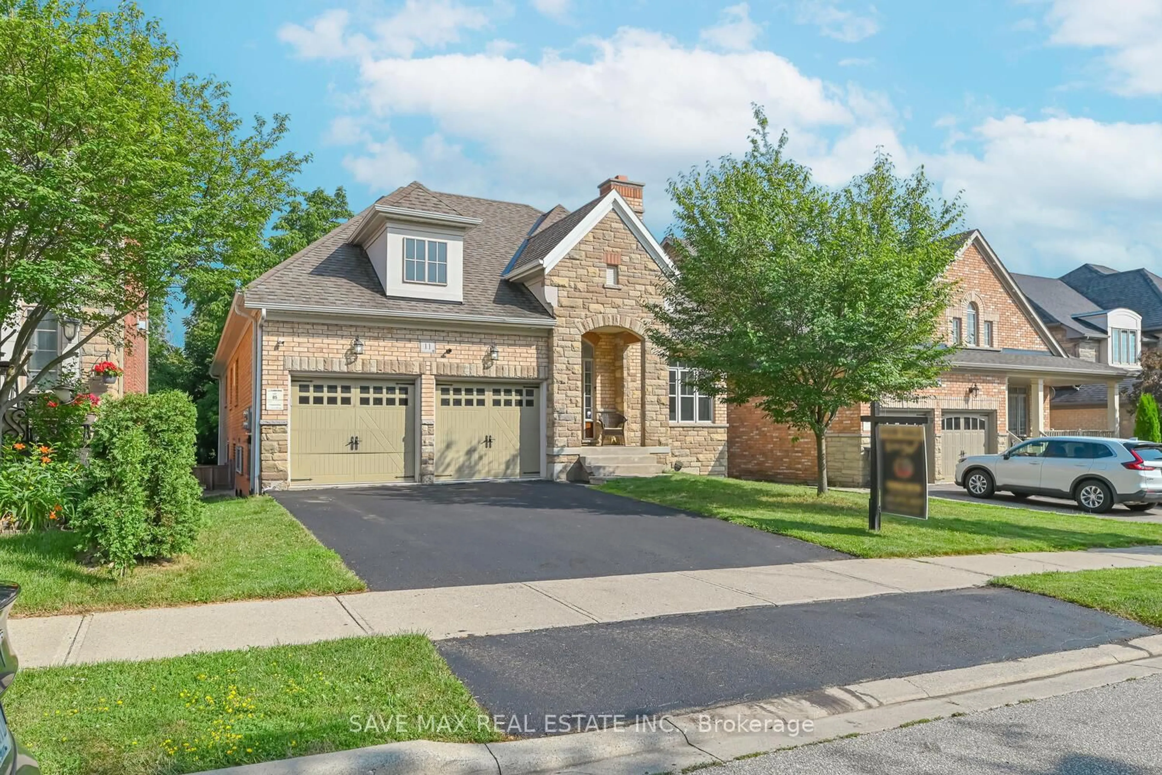 Home with brick exterior material, street for 11 Haywood Dr, Brampton Ontario L6X 0W1