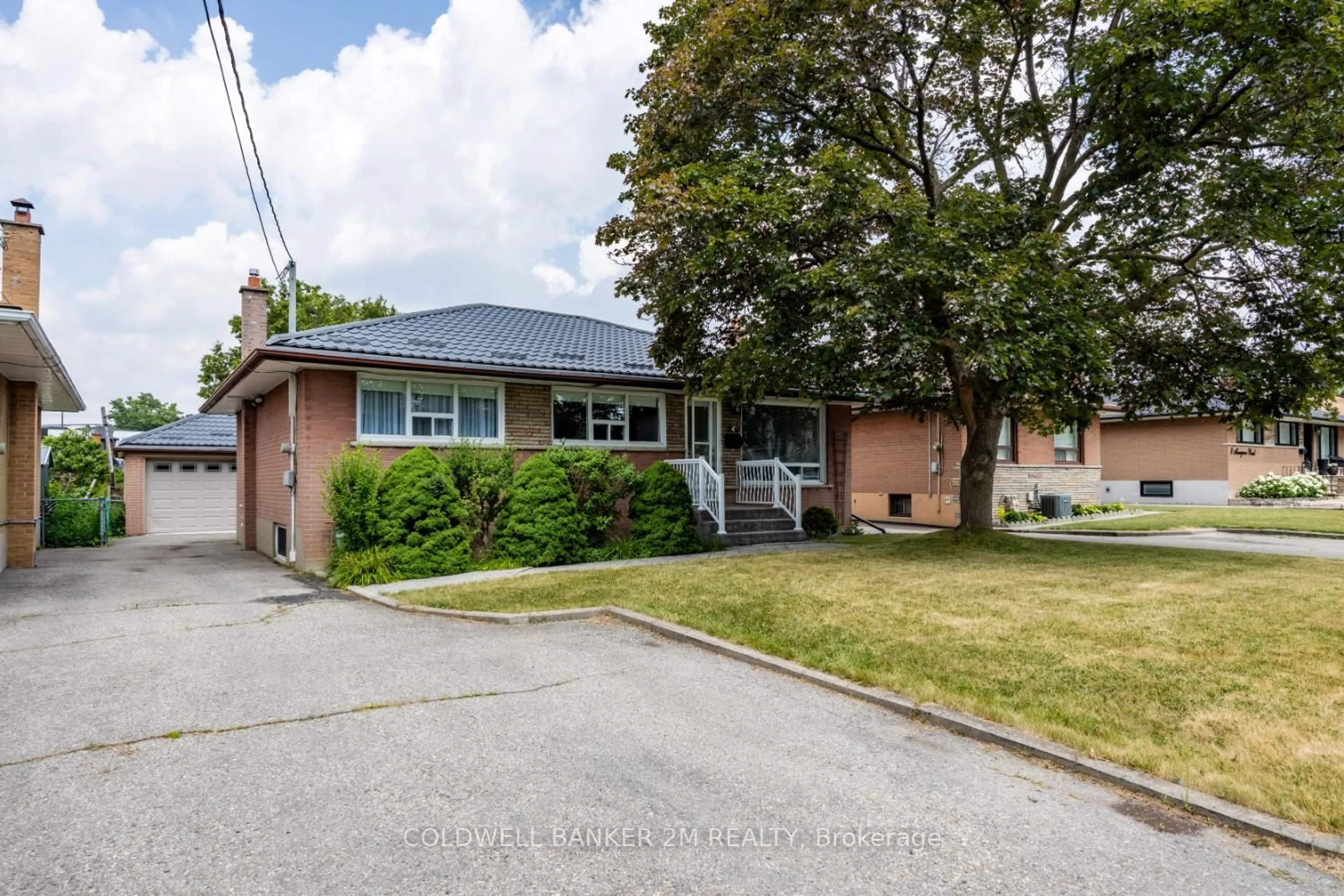Home with brick exterior material, street for 4 Mangrove Rd, Toronto Ontario M6L 2A1