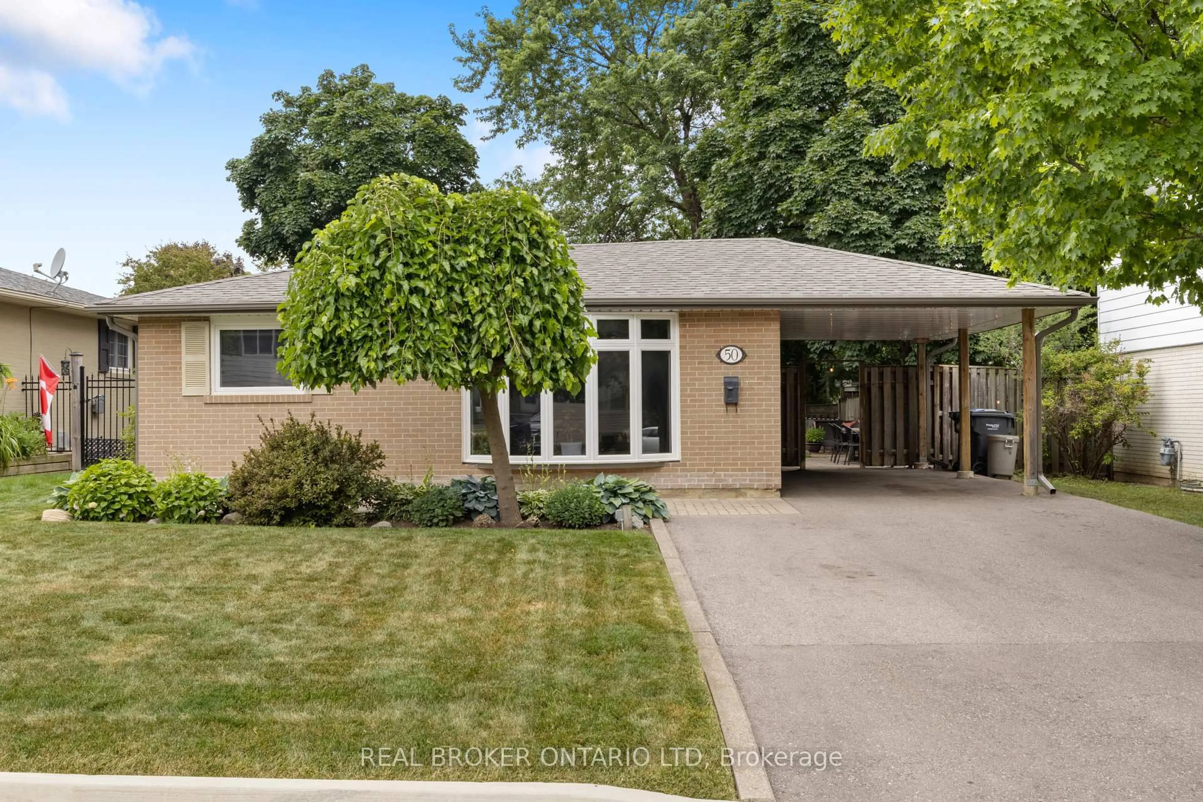 Home with brick exterior material, street for 50 Watson Cres, Brampton Ontario L6W 1E7