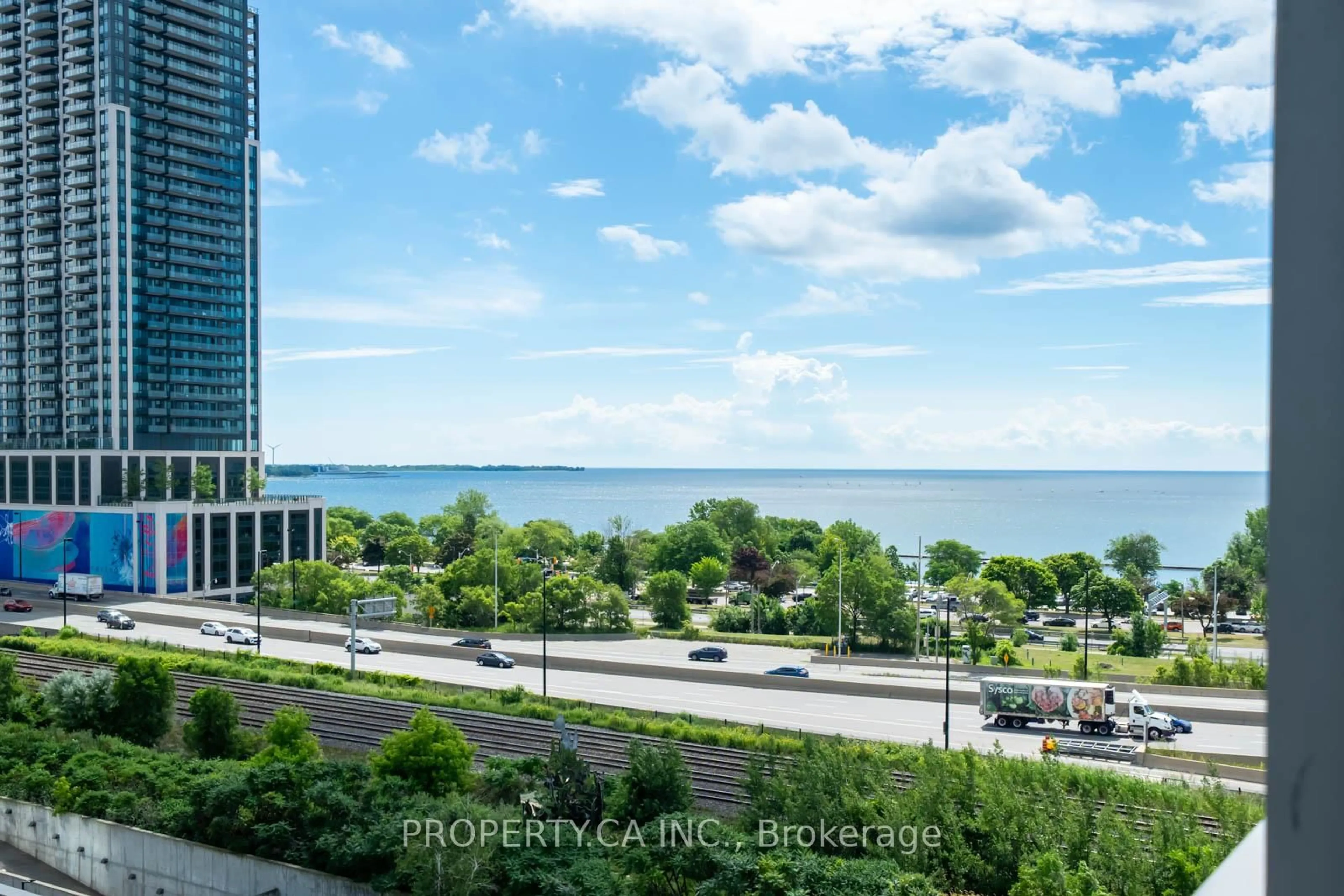 A pic from outside/outdoor area/front of a property/back of a property/a pic from drone, water/lake/river/ocean view for 105 The Queensway #815, Toronto Ontario M6S 5B5