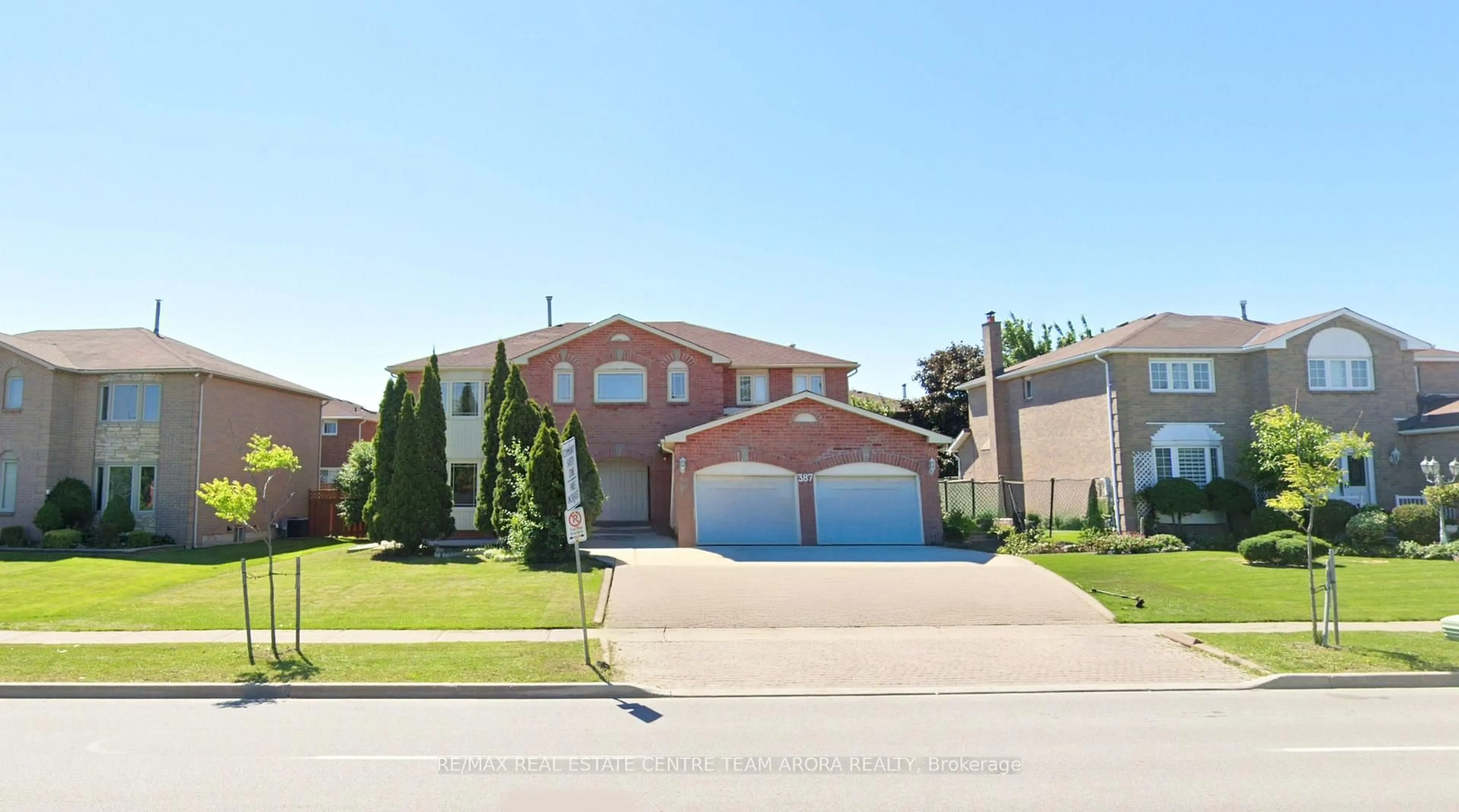 Home with brick exterior material, street for 387 Ray Lawson Blvd, Brampton Ontario L6Y 3X7