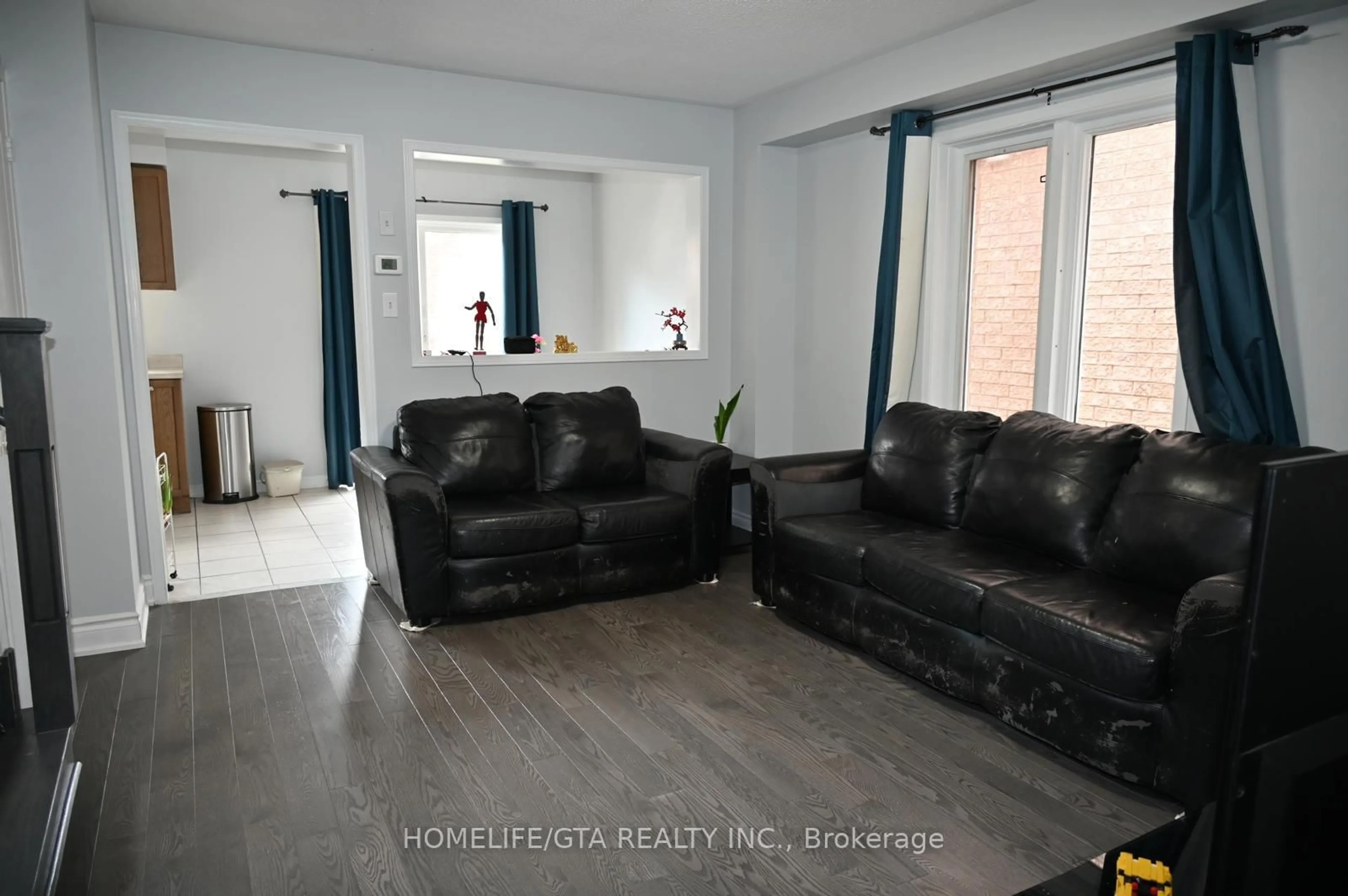 Living room with furniture, unknown for 82 Treasure Dr, Brampton Ontario L7A 3L7