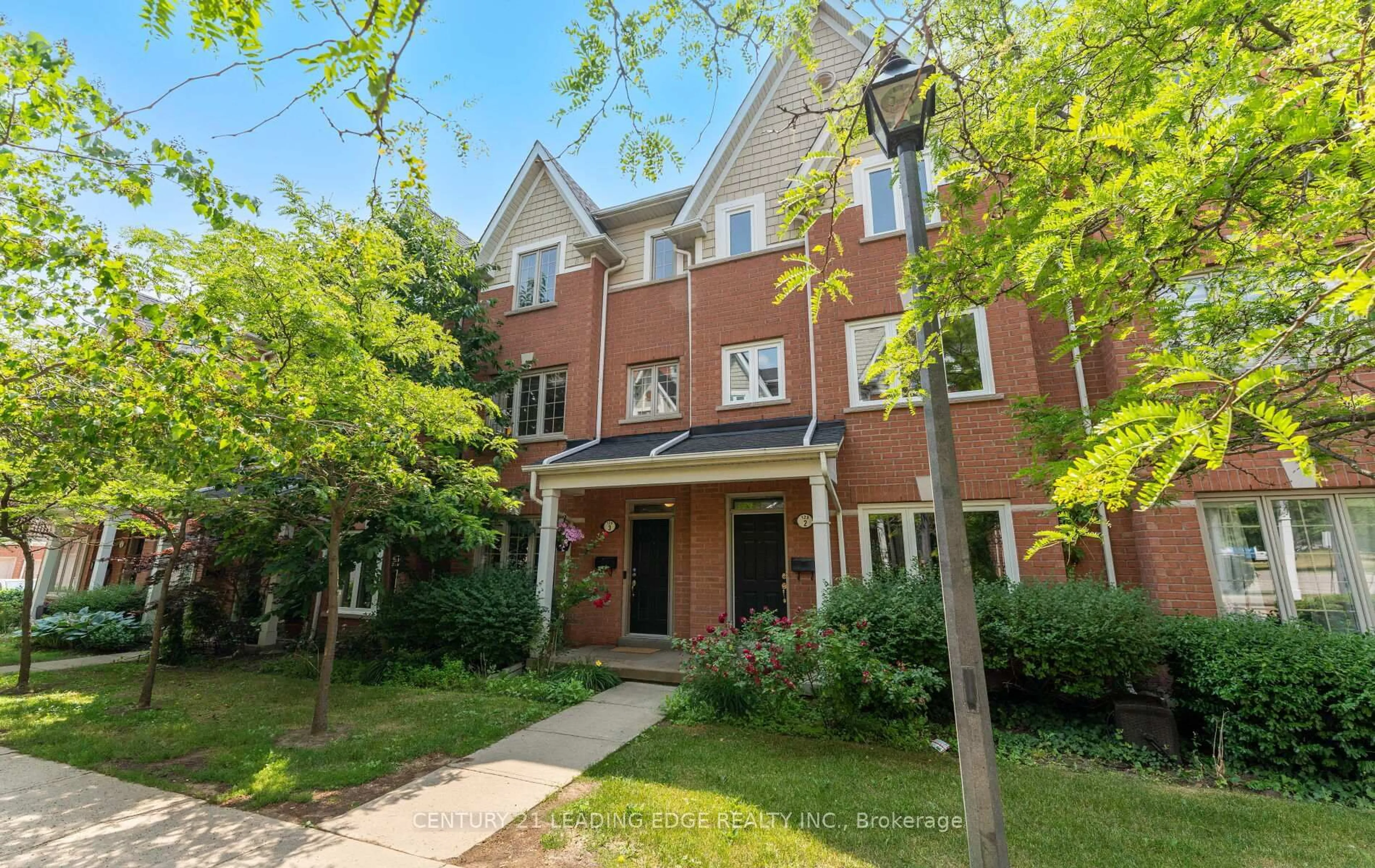 Home with brick exterior material, street for 129 Tenth St #3, Toronto Ontario M8V 4C7