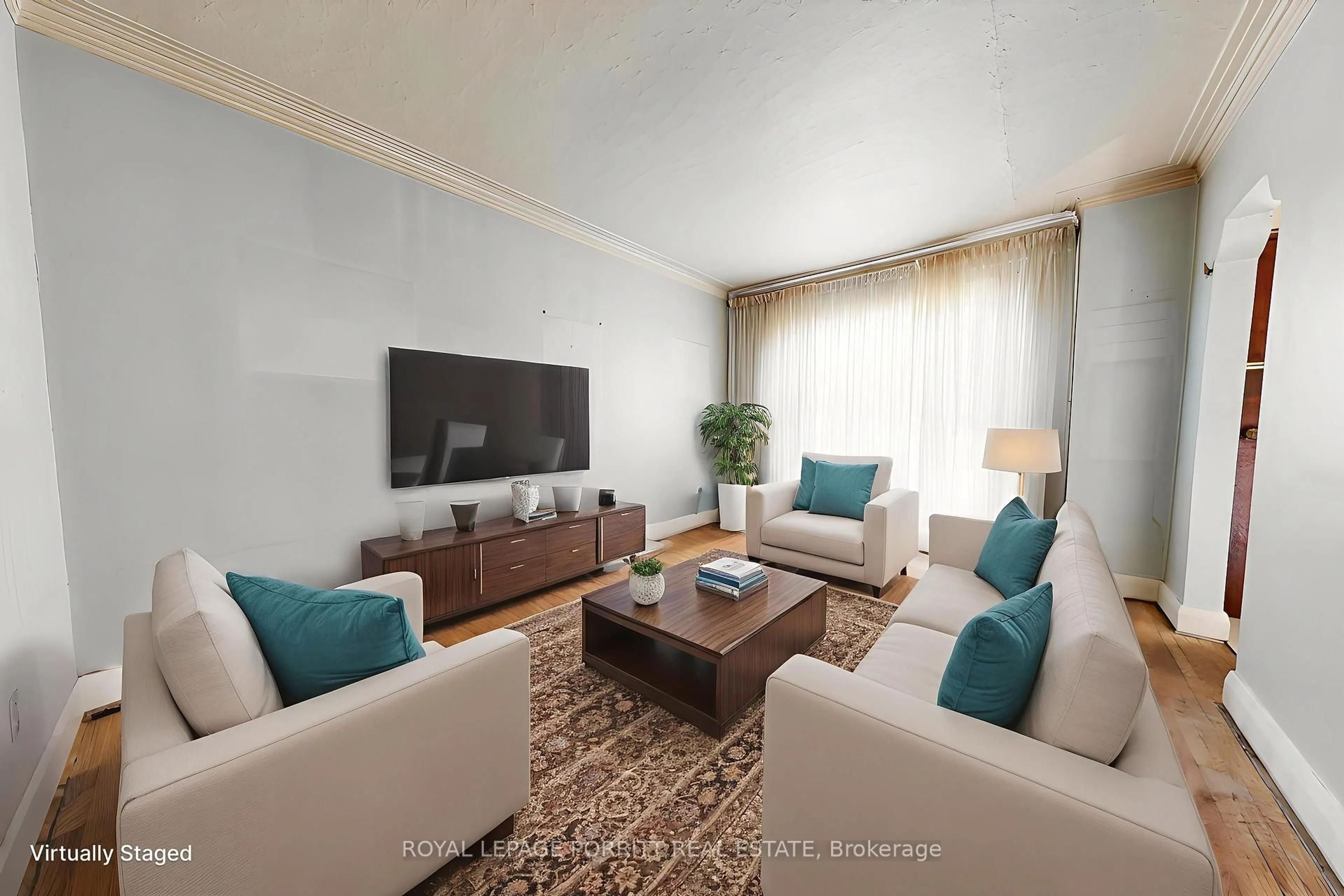 Living room with furniture, unknown for 27 Struthers St, Toronto Ontario M8V 1Y2
