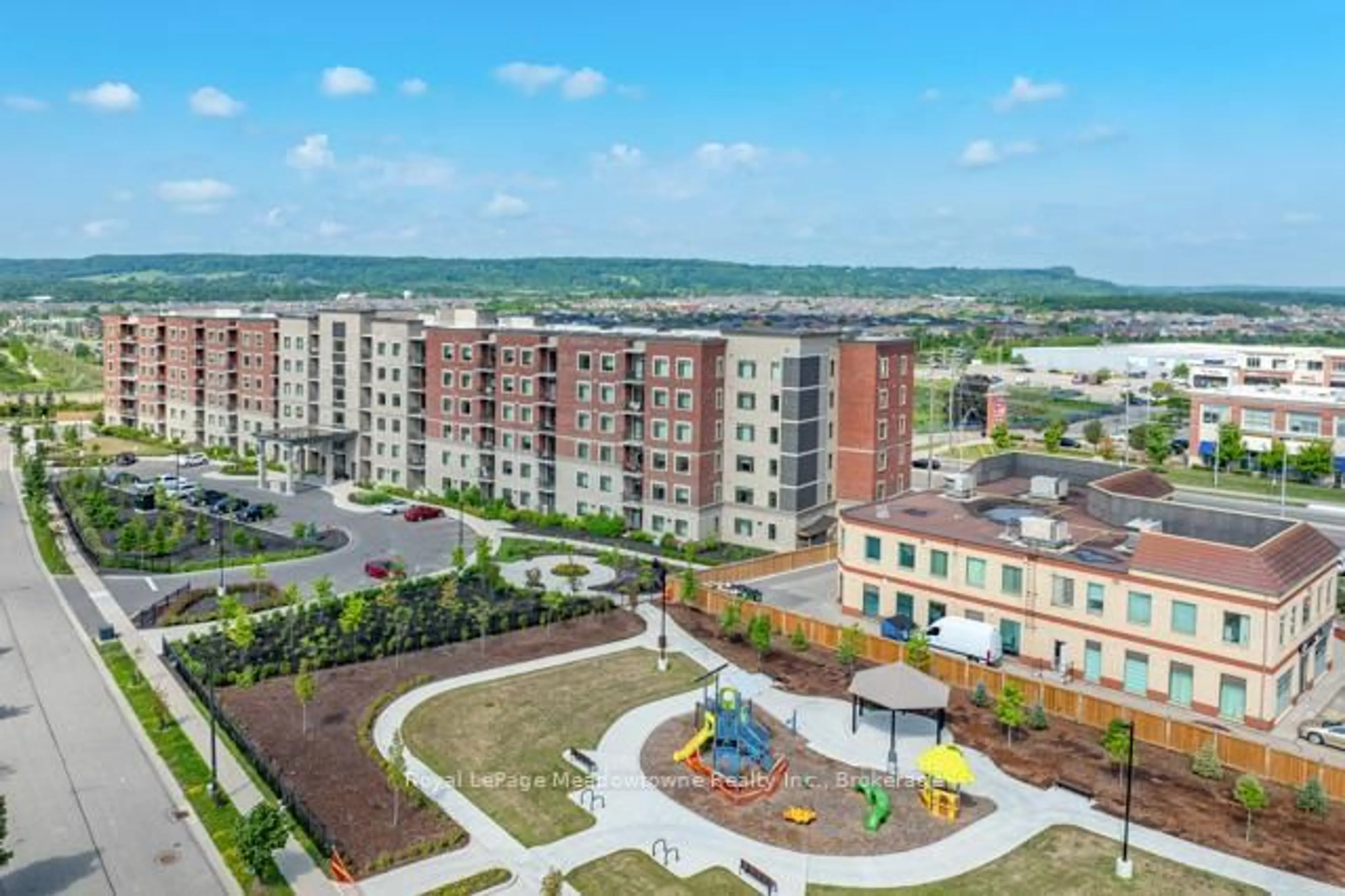 A pic from outside/outdoor area/front of a property/back of a property/a pic from drone, unknown for 830 Megson Terr #422, Milton Ontario L9T 9M7