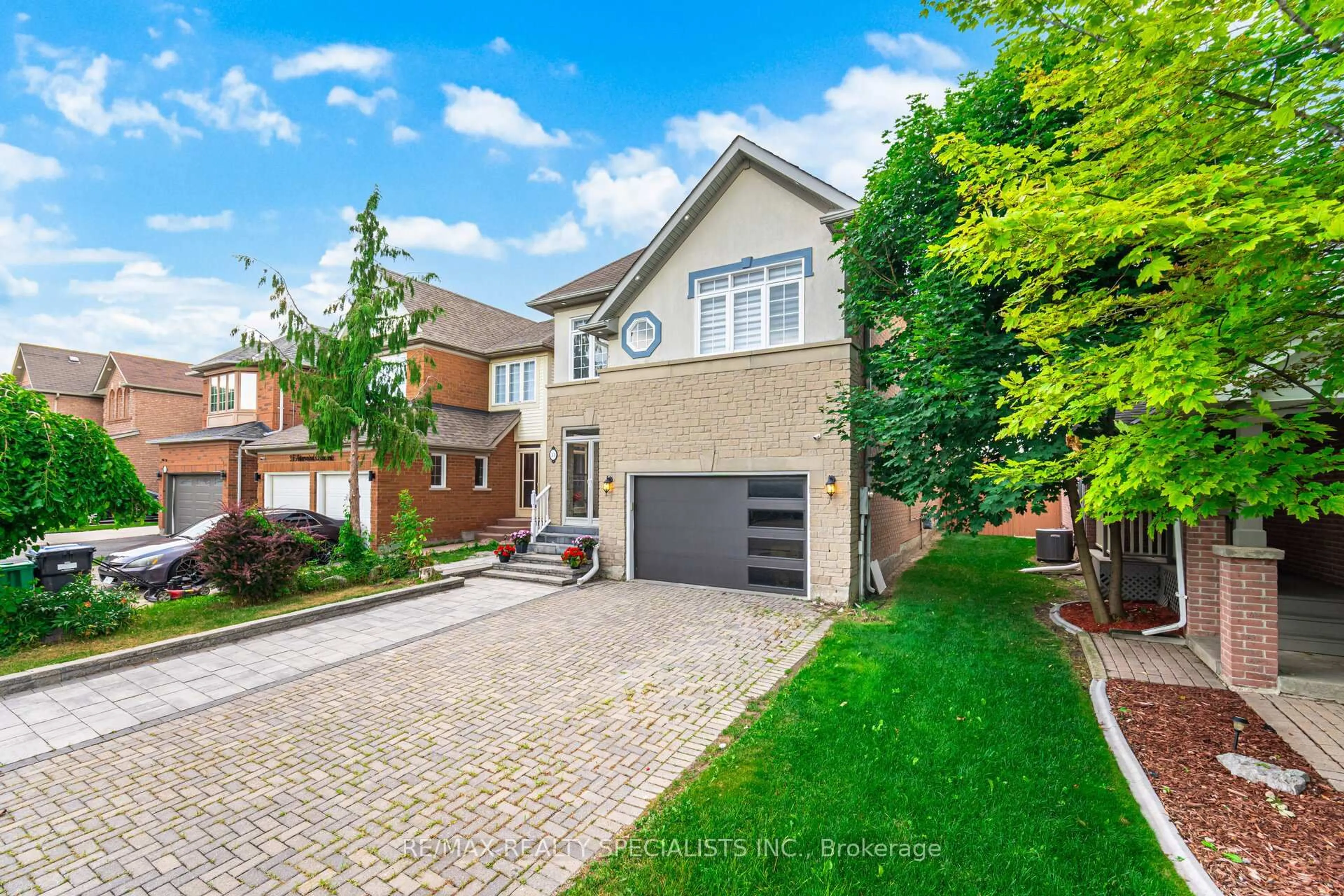 Home with brick exterior material, street for 33 Asterwind Cres, Brampton Ontario L6R 1V8