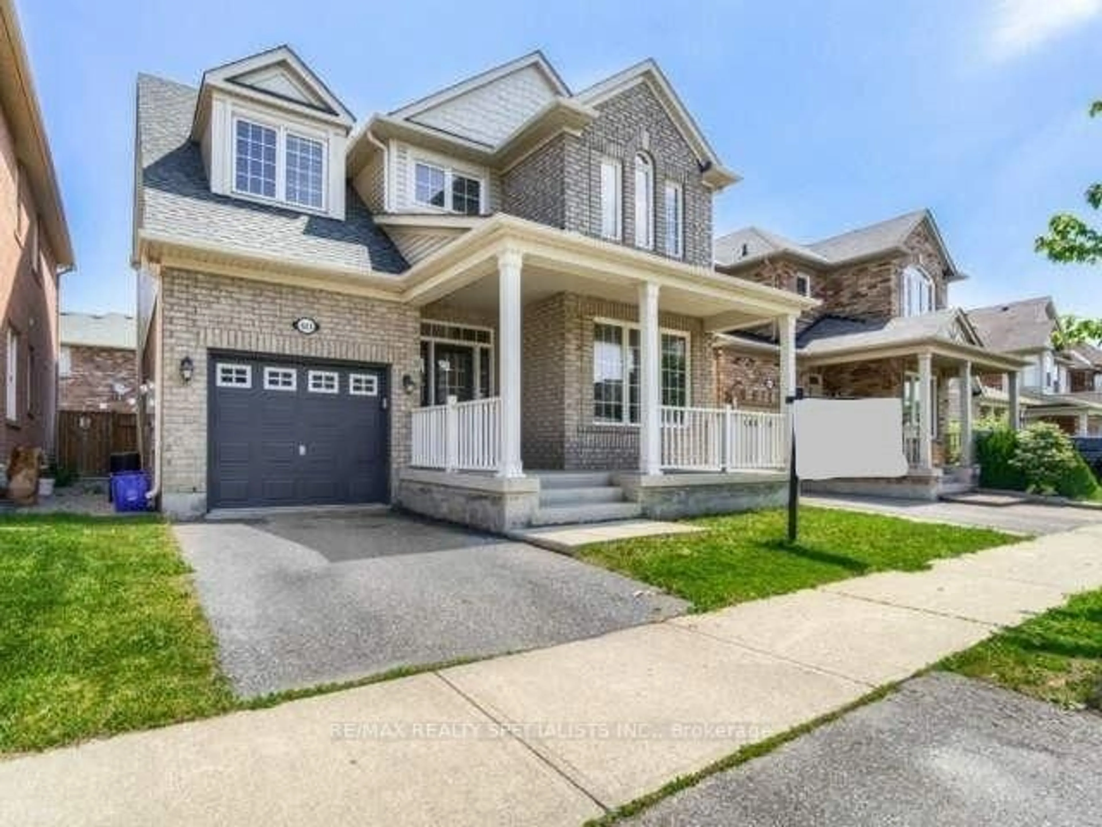 Home with brick exterior material, street for 923 Vickerman Way, Milton Ontario L9T 0K5